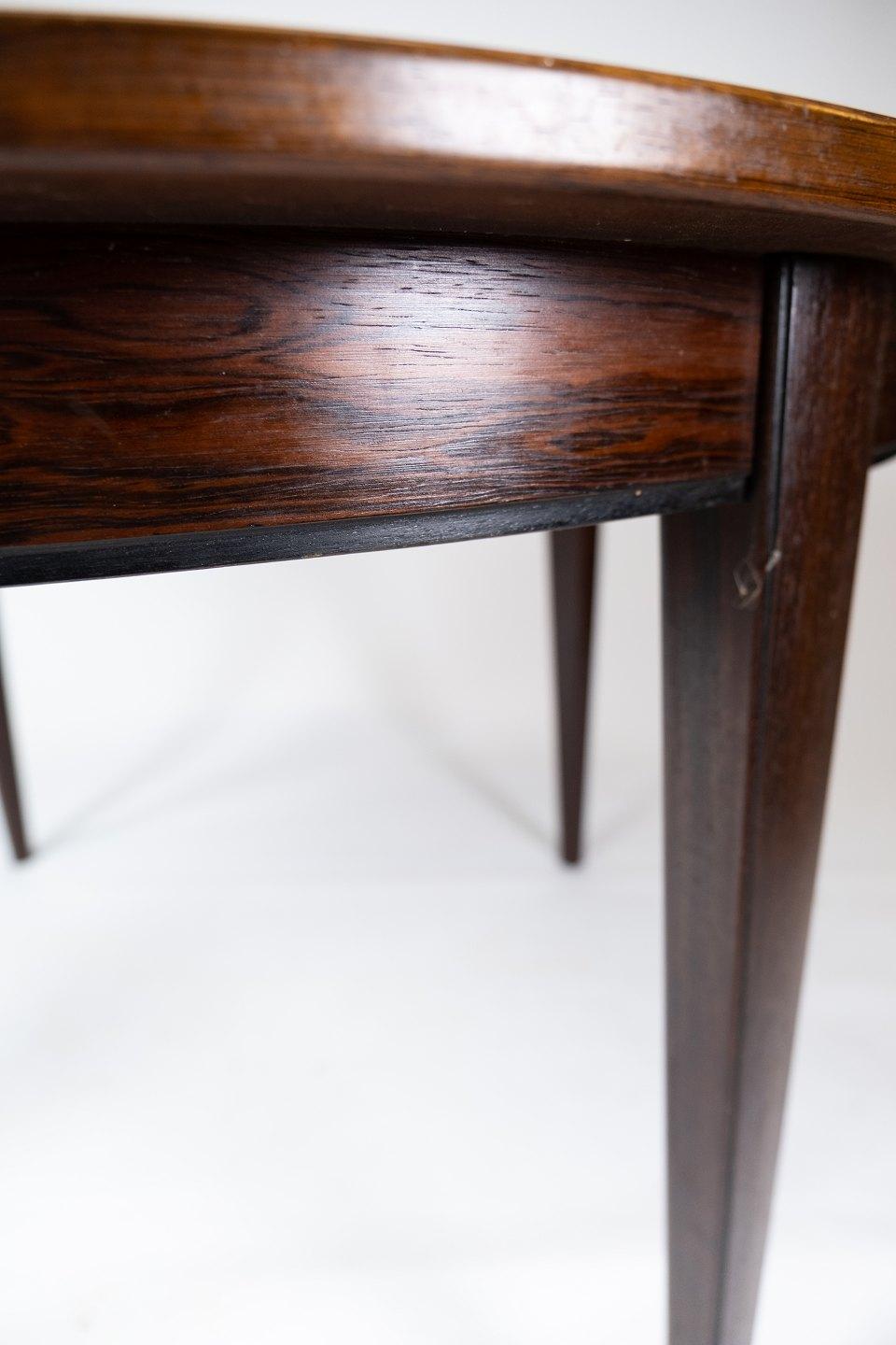 Scandinavian Modern Dining Table in Rosewood Designed by Omann Junior from the 1960s.  For Sale