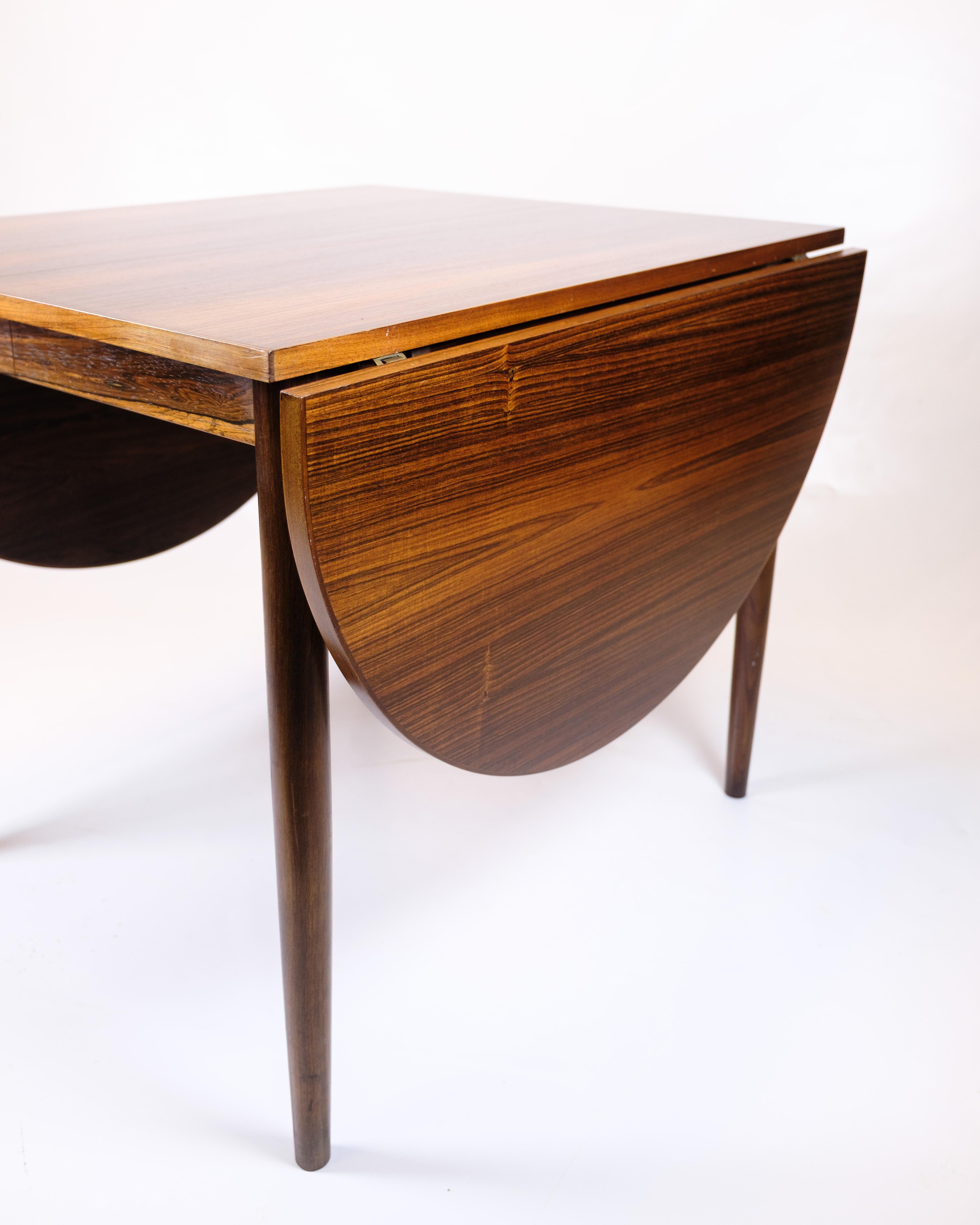 Mesa De Comedor De Palisandro Con 2 Hojas Extensibles Y Tapas By Arne Vodder mediados del siglo XX en venta
