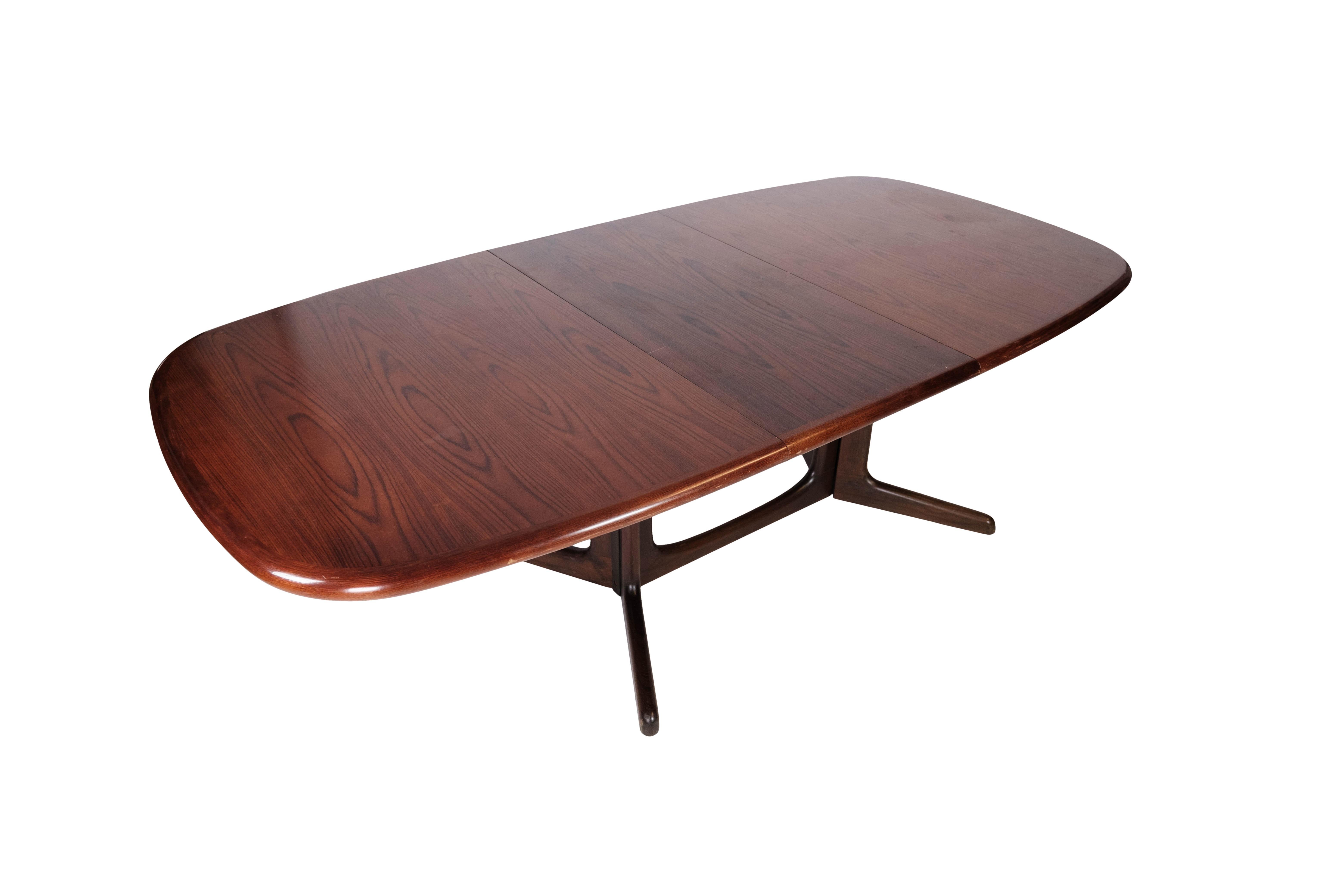Dining table in rosewood with extension of danish design manufactured by Gudme Furniture Factory in the 1960s. The table is in great vintage condition.
The two extensions are 49 cm each.