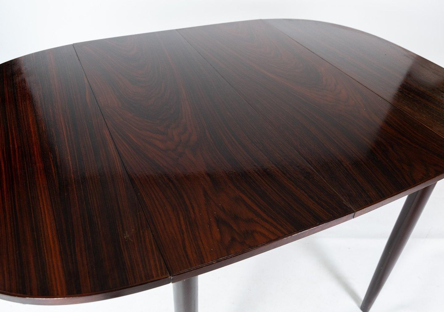 Danish Dining Table in Rosewood with Extensions Designed by Arne Vodder from the 1960s For Sale