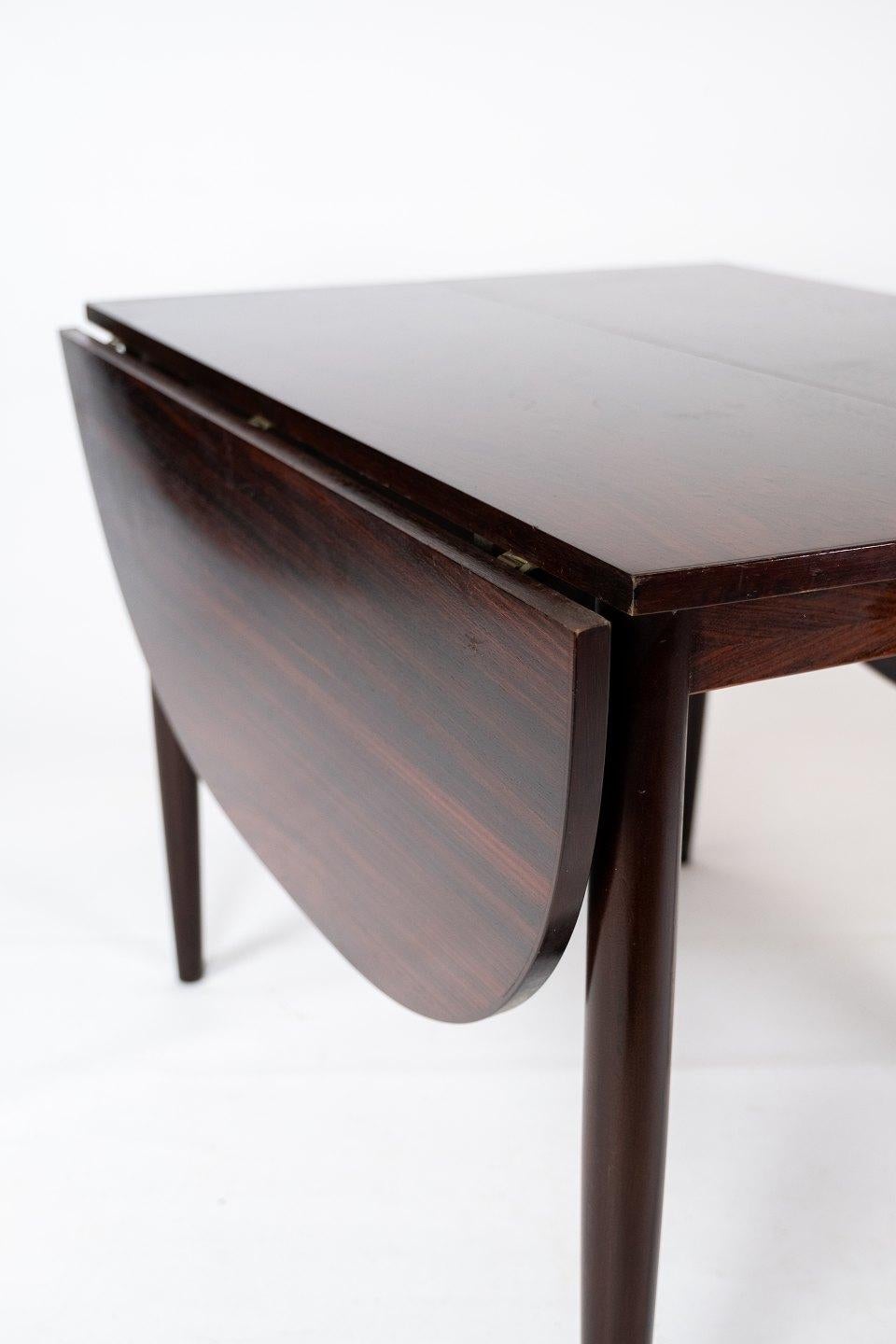 Mid-20th Century Dining Table in Rosewood with Extensions Designed by Arne Vodder from the 1960s For Sale