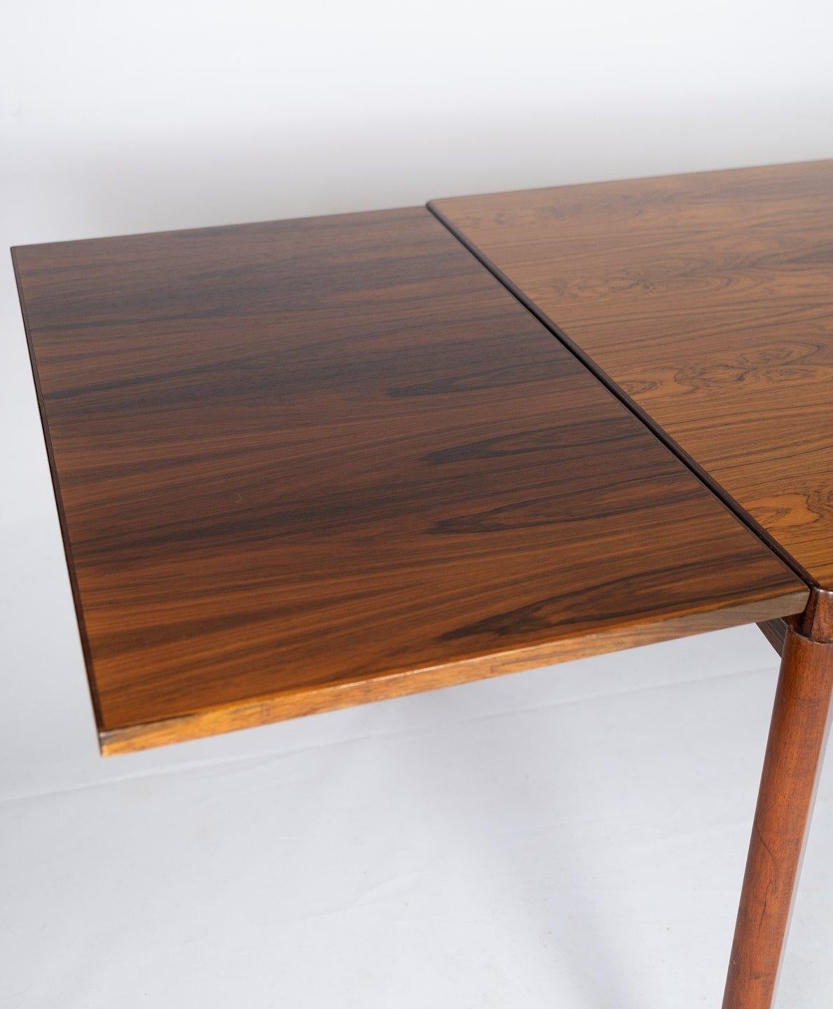 Dining Table in Rosewood with Extensions Designed by Henning Kjærnulf, 1960s 4