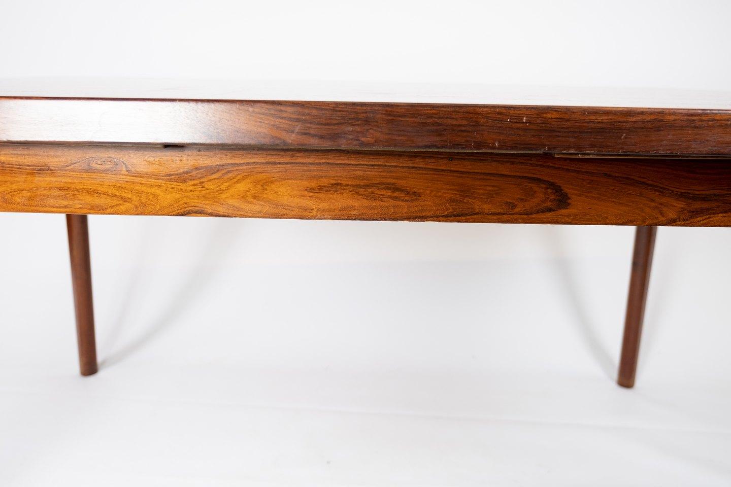 Mid-20th Century Dining Table in Rosewood with Extensions Designed by Henning Kjærnulf, 1960s