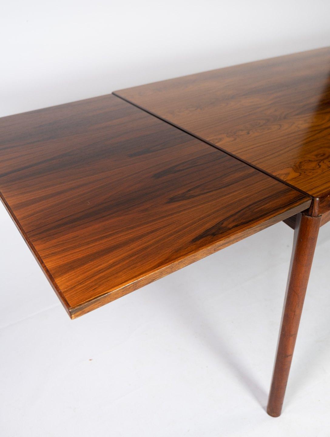Dining Table in Rosewood with Extensions Designed by Henning Kjærnulf, 1960s 1