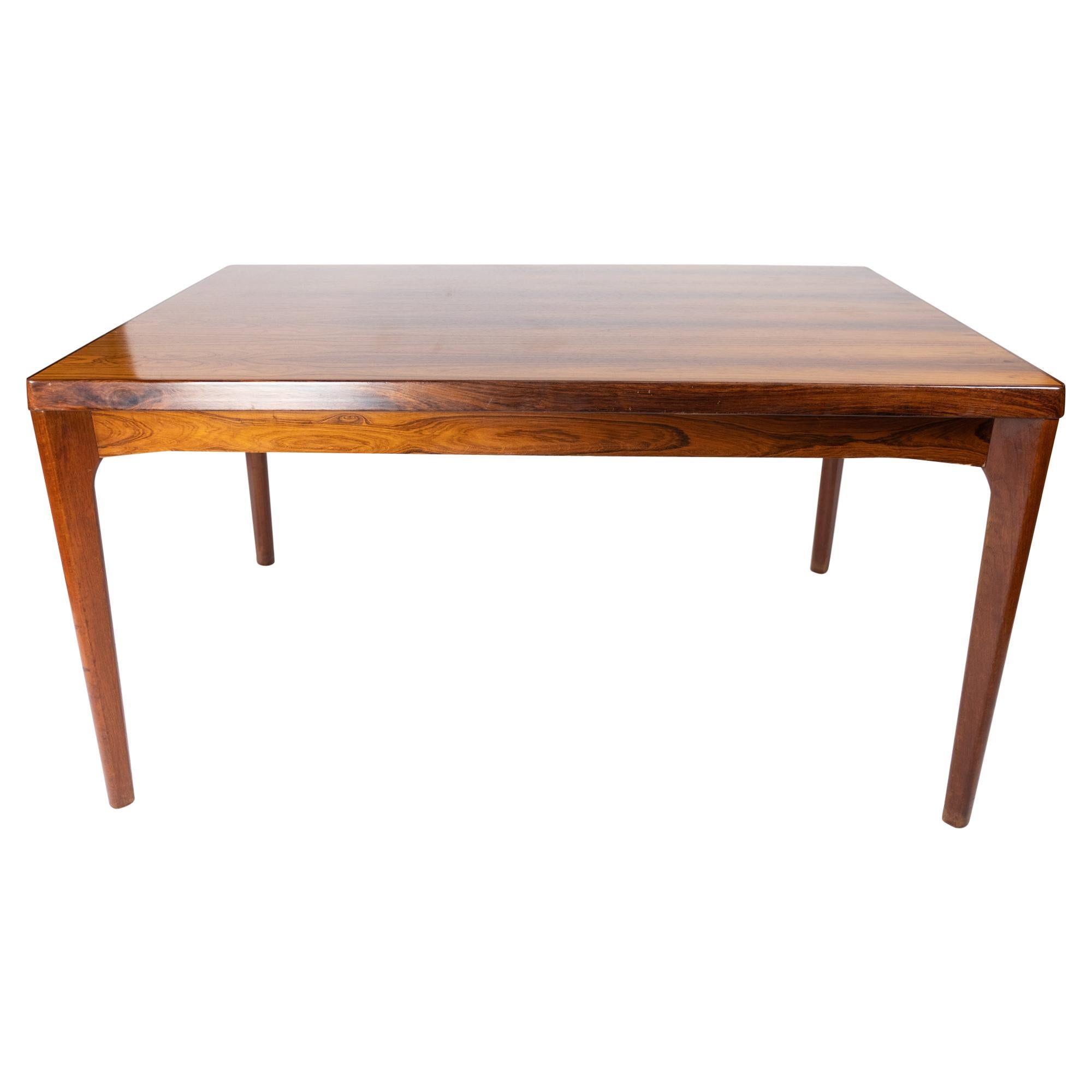 Dining Table in Rosewood with Extensions Designed by Henning Kjærnulf, 1960s