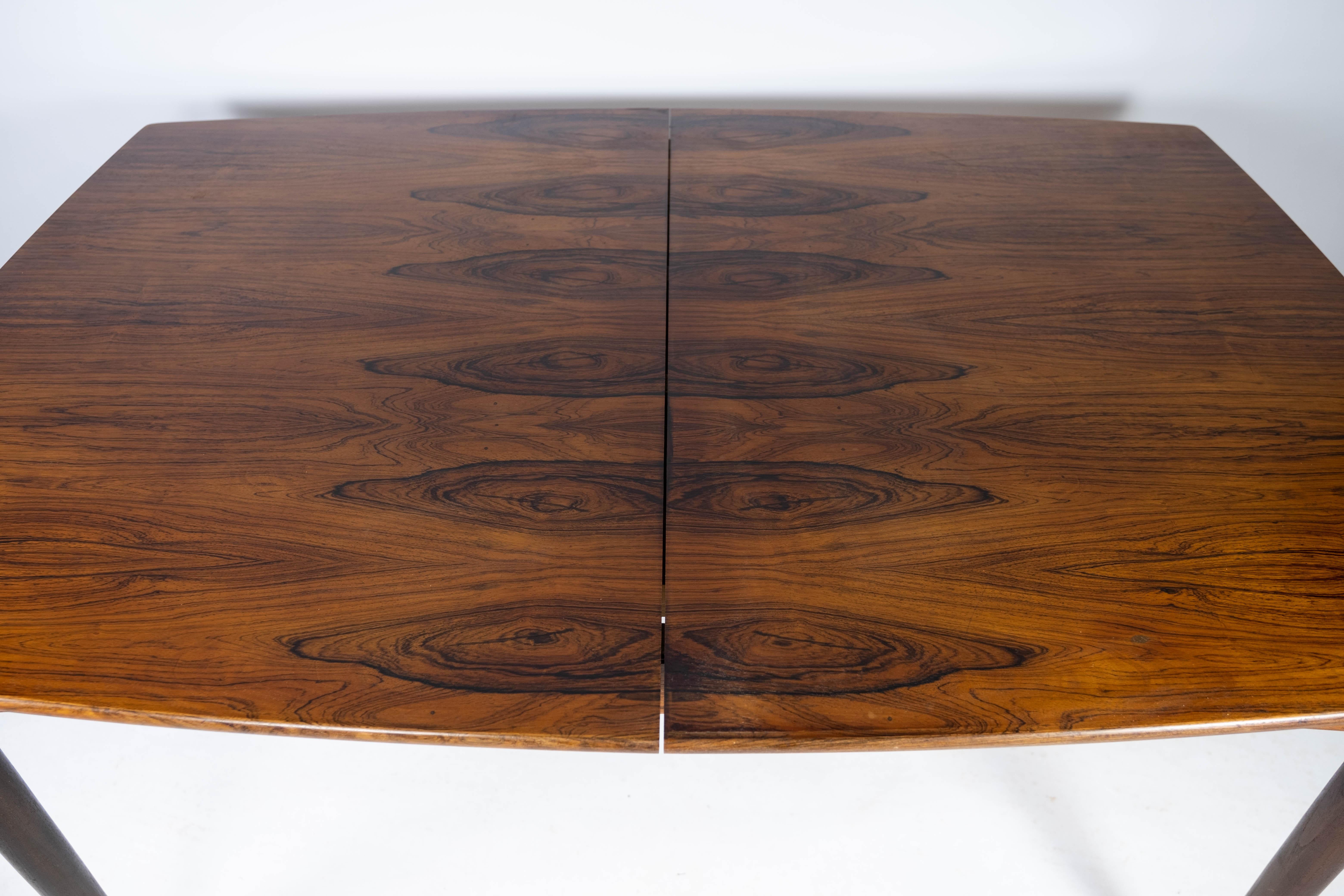 Scandinavian Modern Dining Table in Rosewood with Extensions, of Danish Design from the 1960s