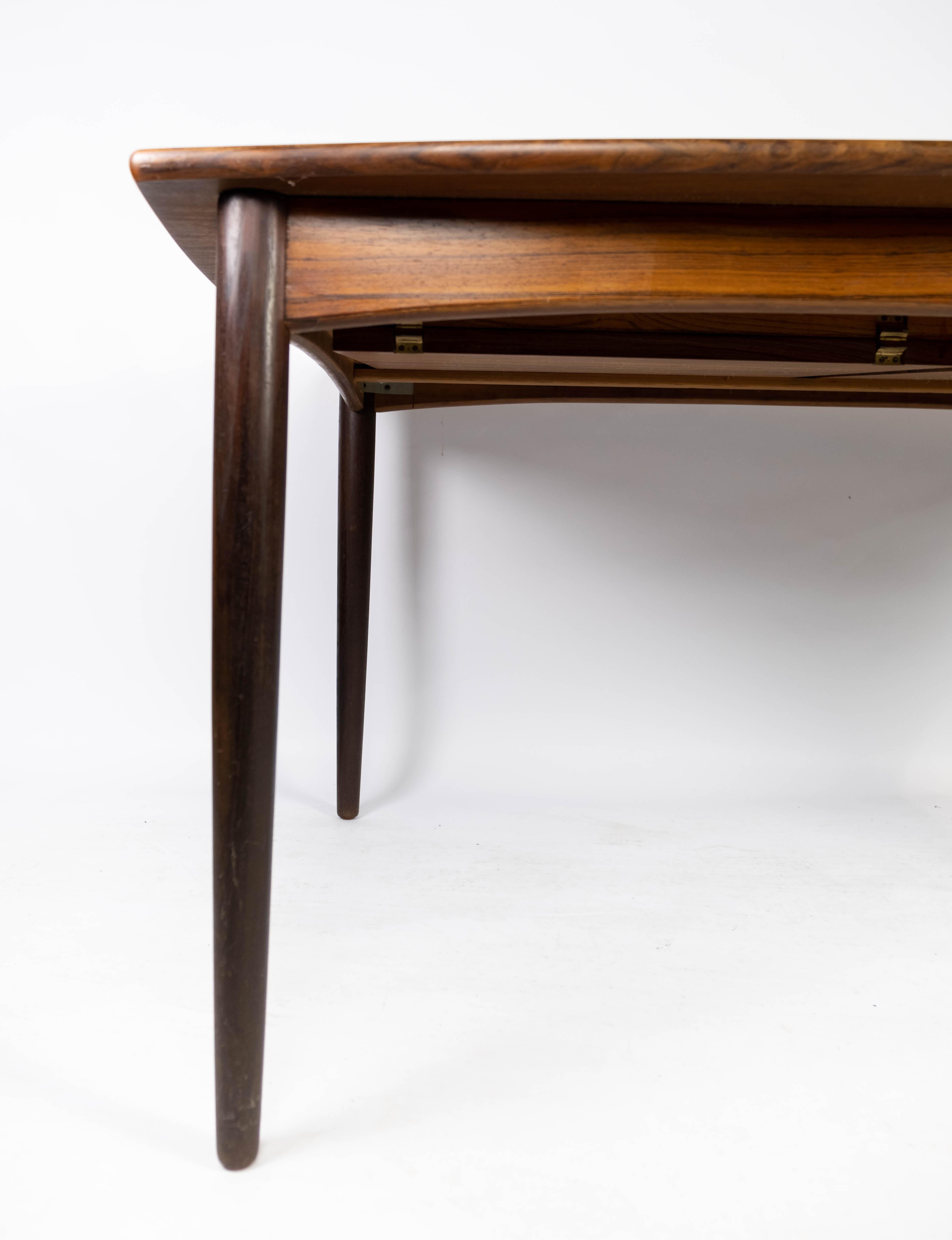 Mid-20th Century Dining Table in Rosewood with Extensions, of Danish Design from the 1960s