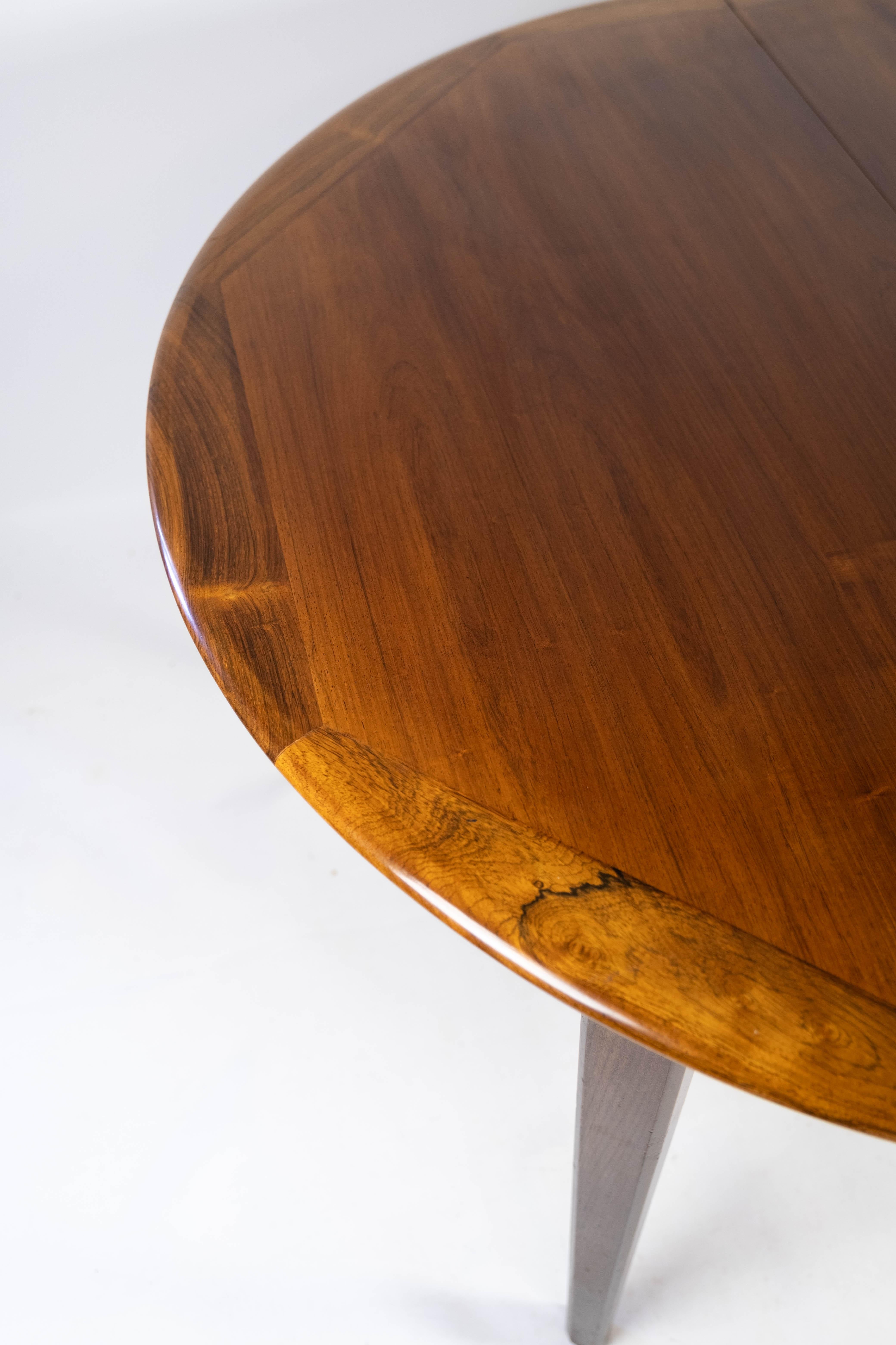 Milieu du XXe siècle Table de salle à manger fabriquée en bois de rose avec assiettes à rallonge, design danois des années 1960 en vente