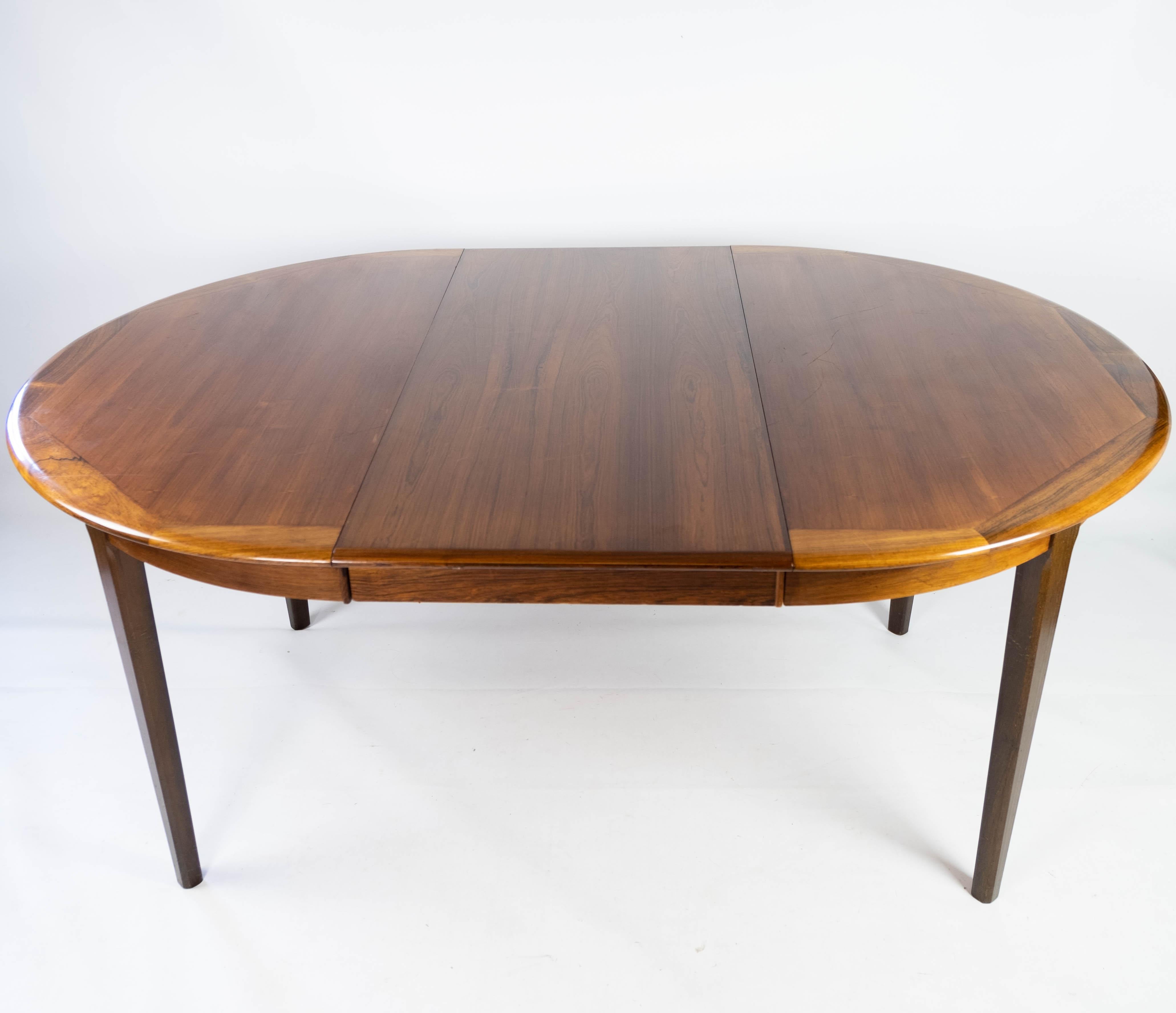 Table de salle à manger fabriquée en bois de rose avec assiettes à rallonge, design danois des années 1960 en vente 1