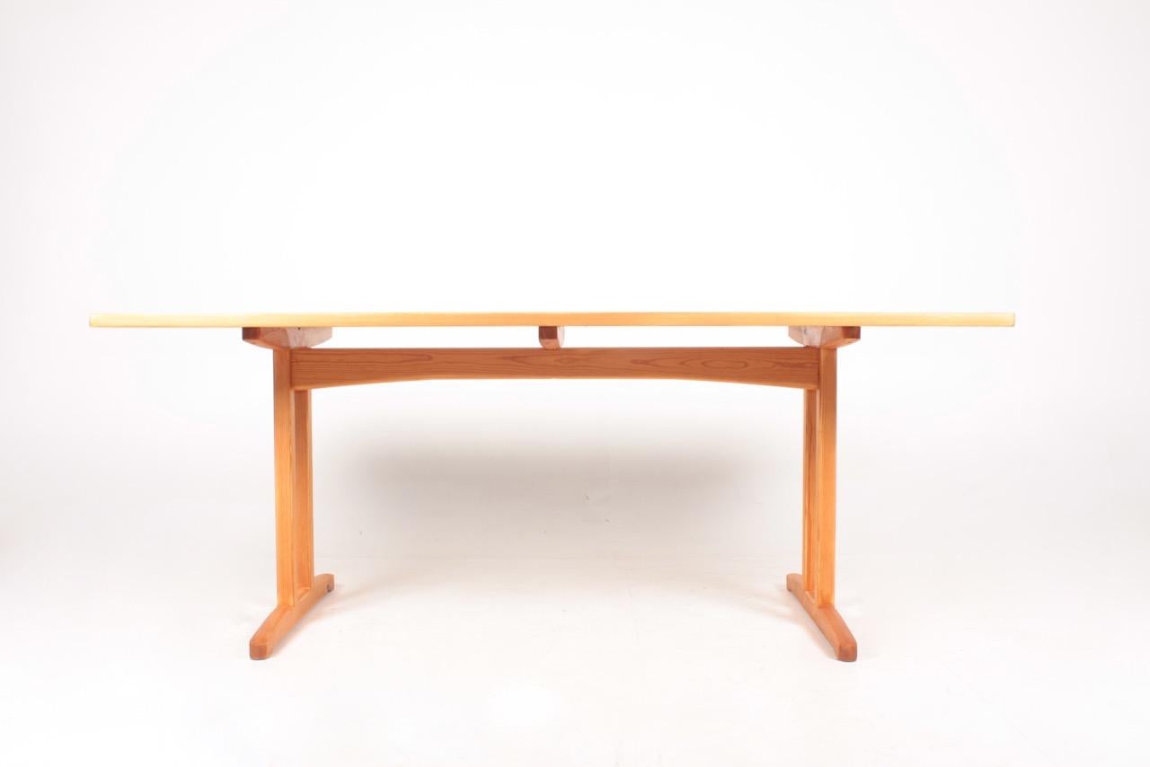 Dining table in Scandinavian solid pine, designed and made by Søborg Furniture. Made in Denmark, great original condition.