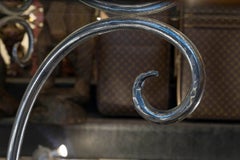 Dining table in solid wrought iron and glass top, 20th century.