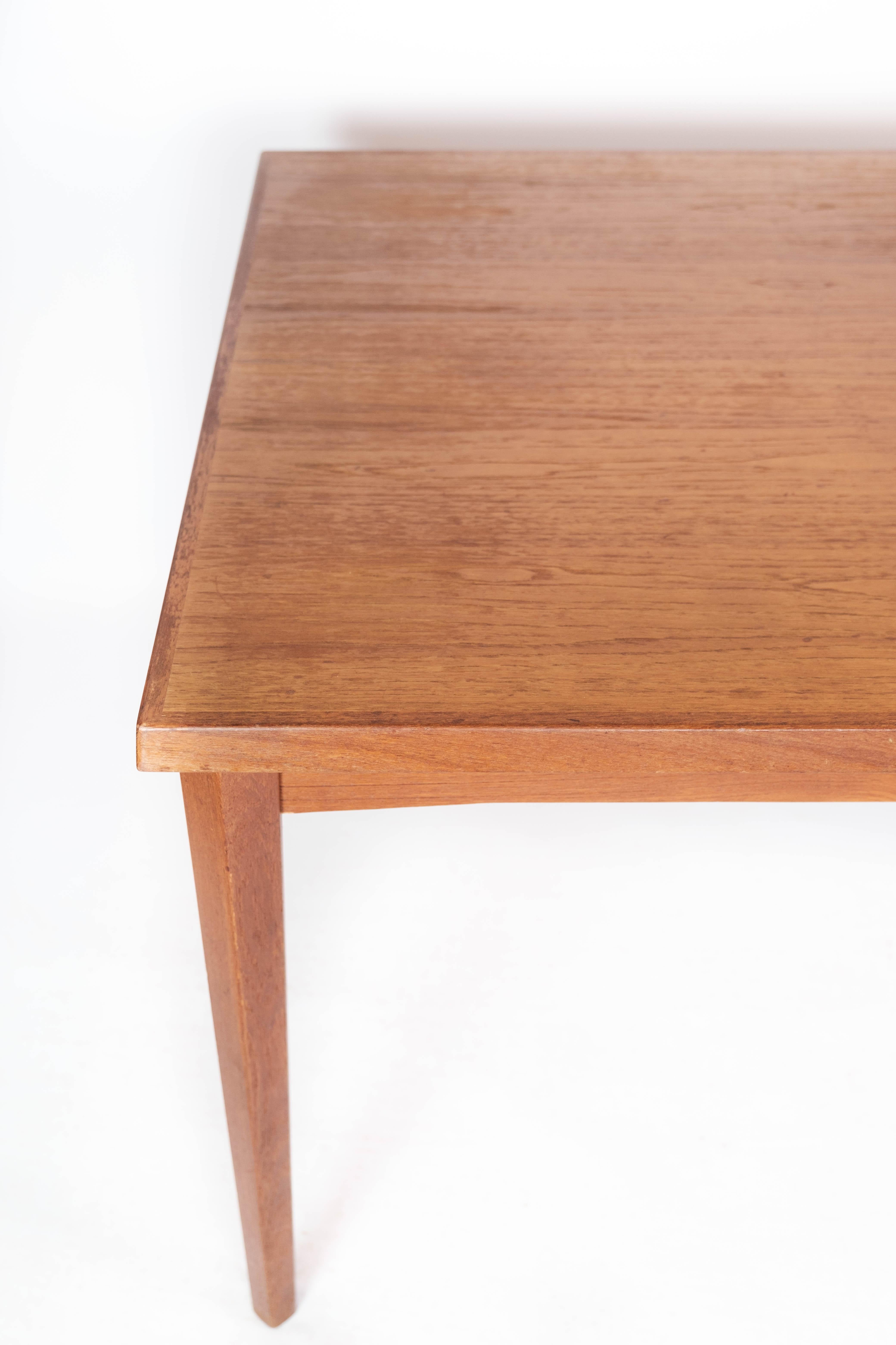 Scandinavian Modern Dining Table in Teak with Extension Plates, of Danish Design from the 1960s For Sale