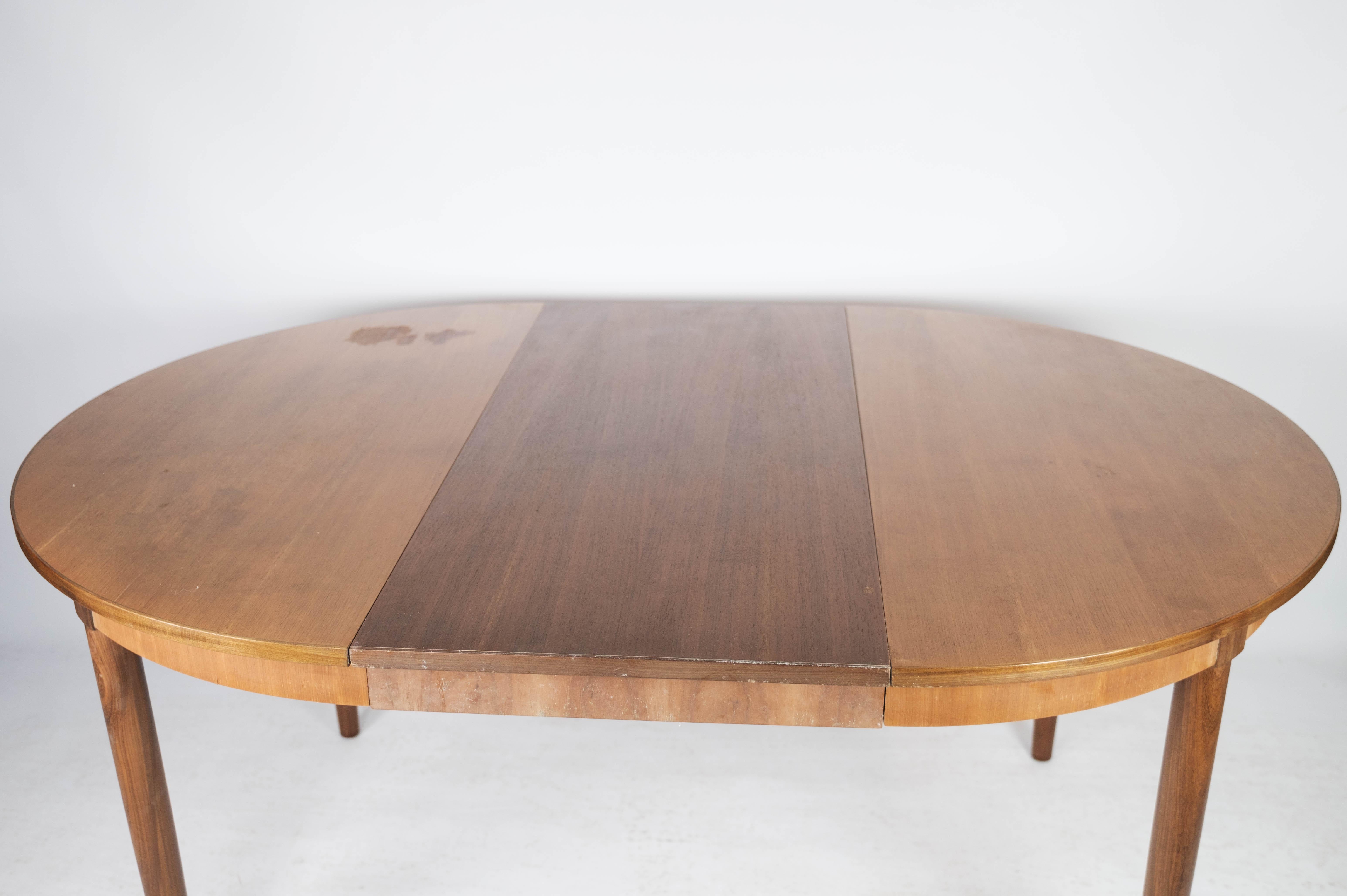 Dining Table Made In Teak With Extensions, Danish Design From 1960s For Sale 7