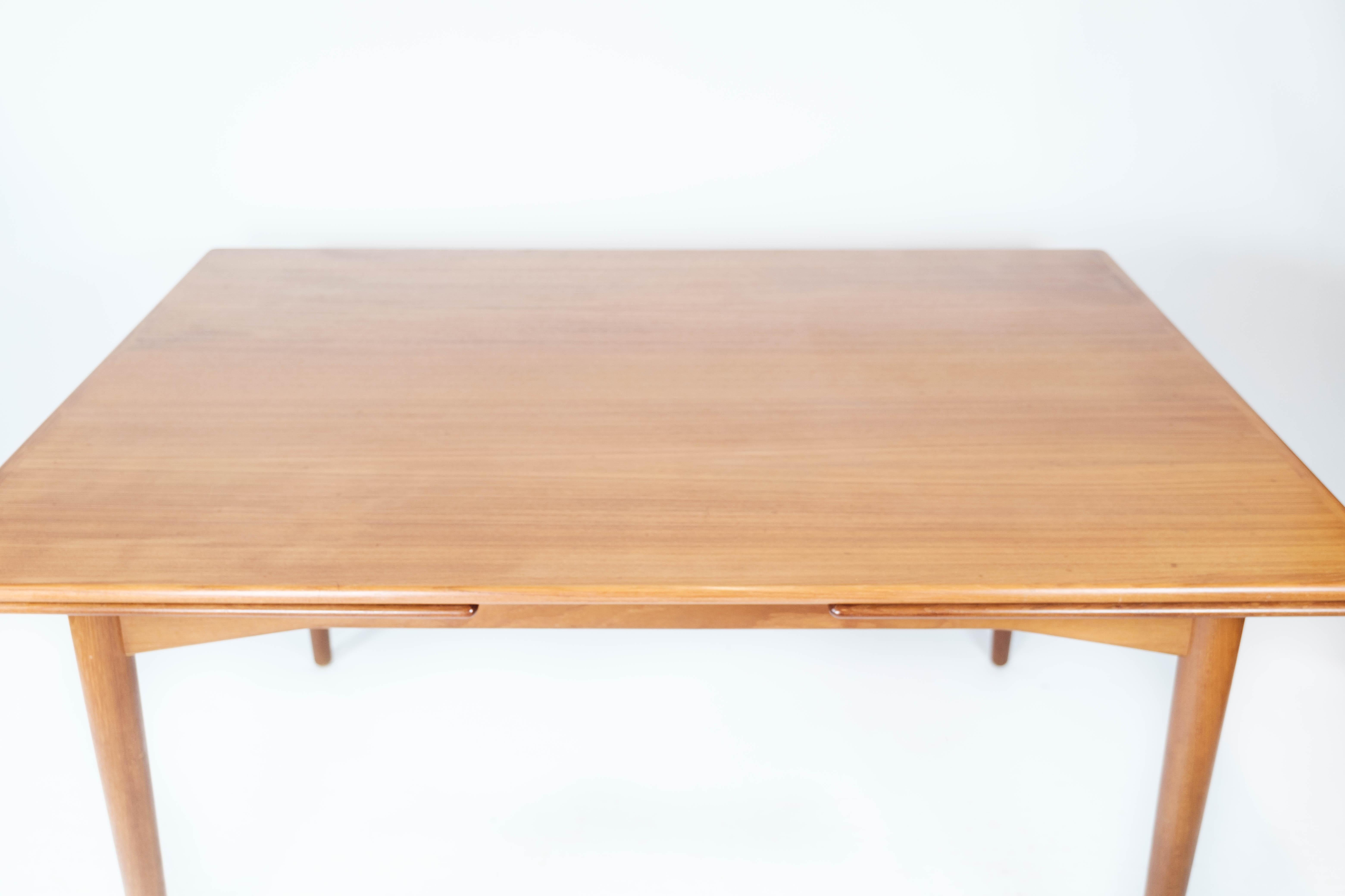 Scandinavian Modern Dining Table in Teak with Extensions of Danish Design from the 1960s