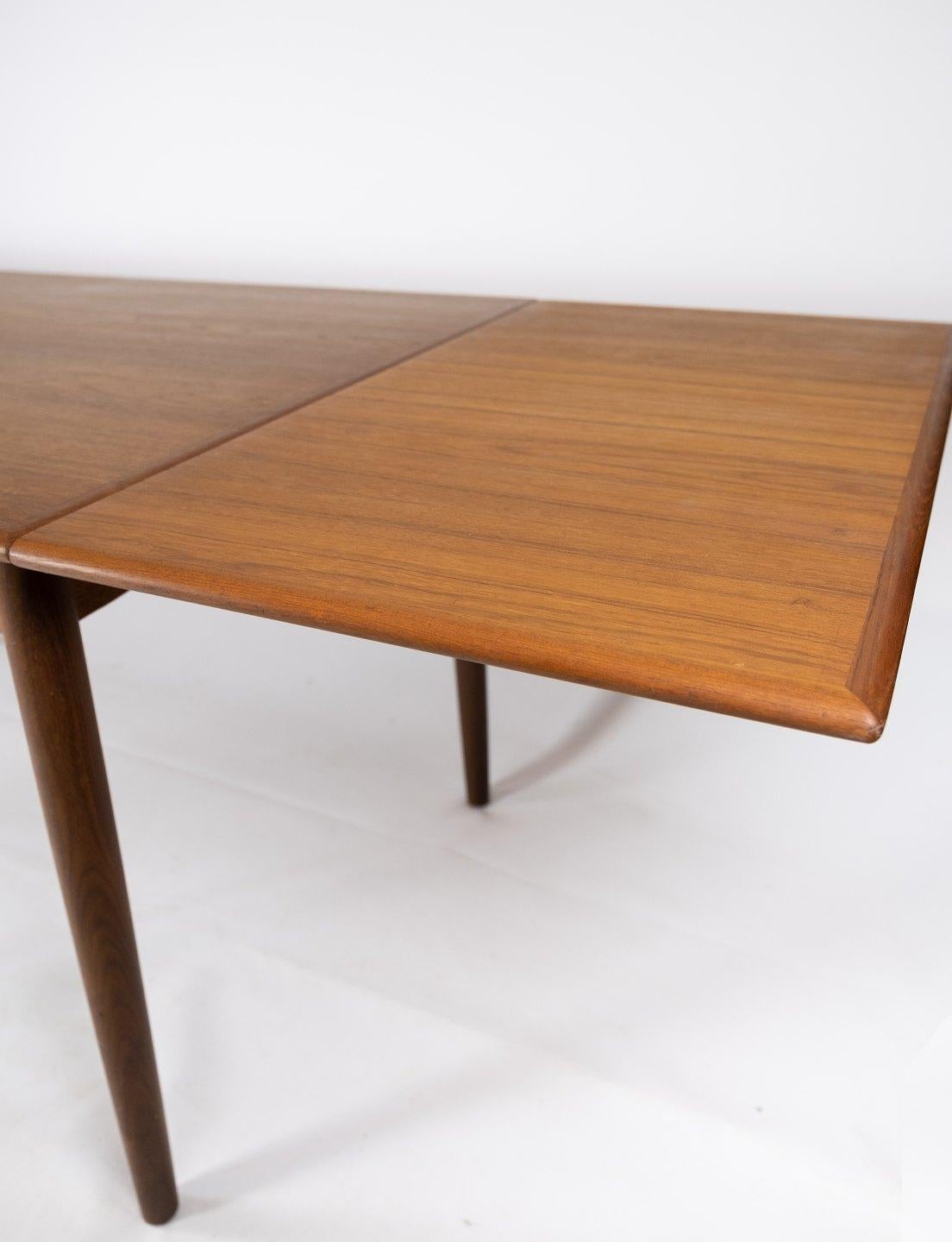 Mid-20th Century Dining Table Made In Teak With Extensions, Danish Design From 1960s For Sale