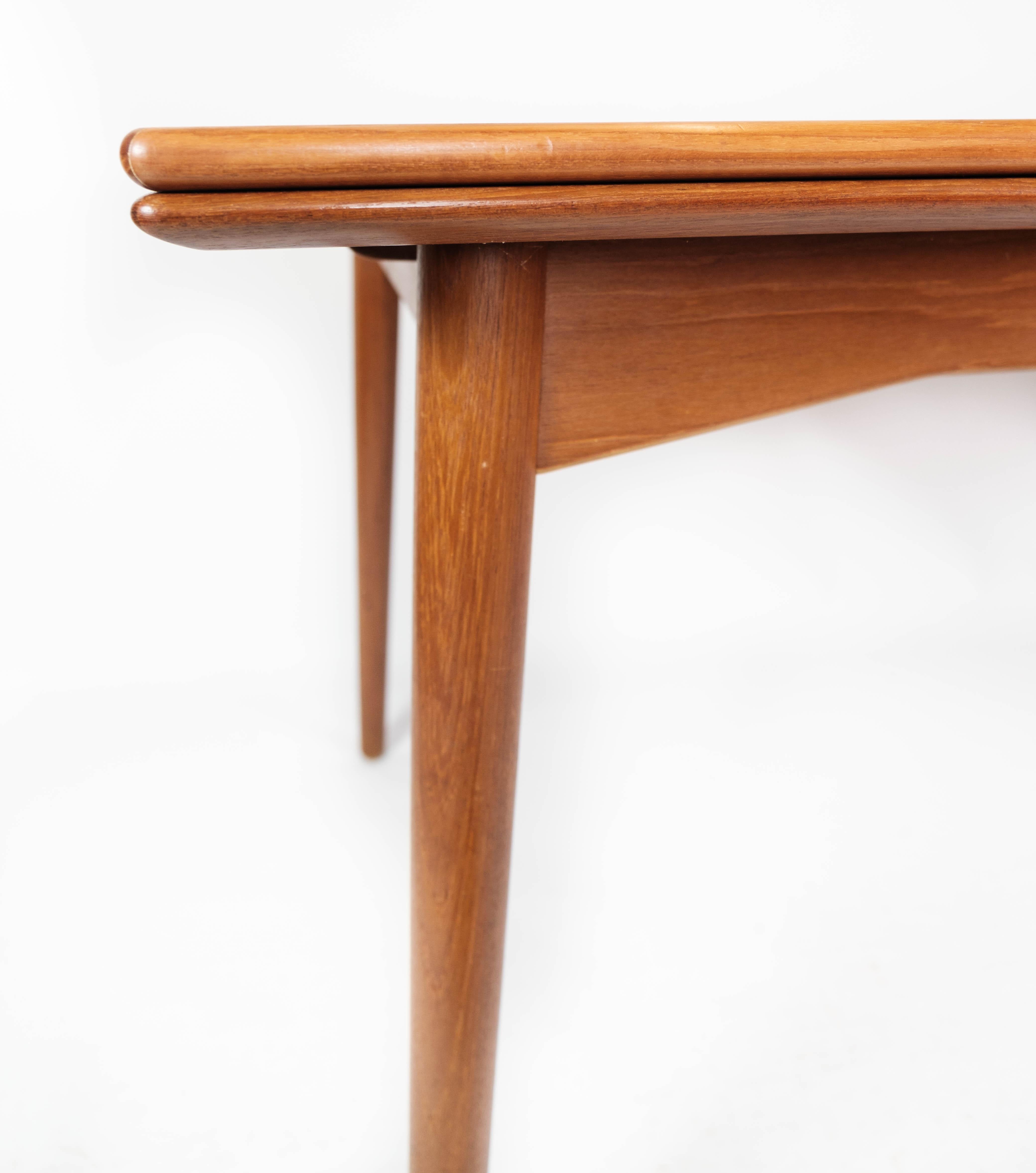 Mid-20th Century Dining Table in Teak with Extensions of Danish Design from the 1960s