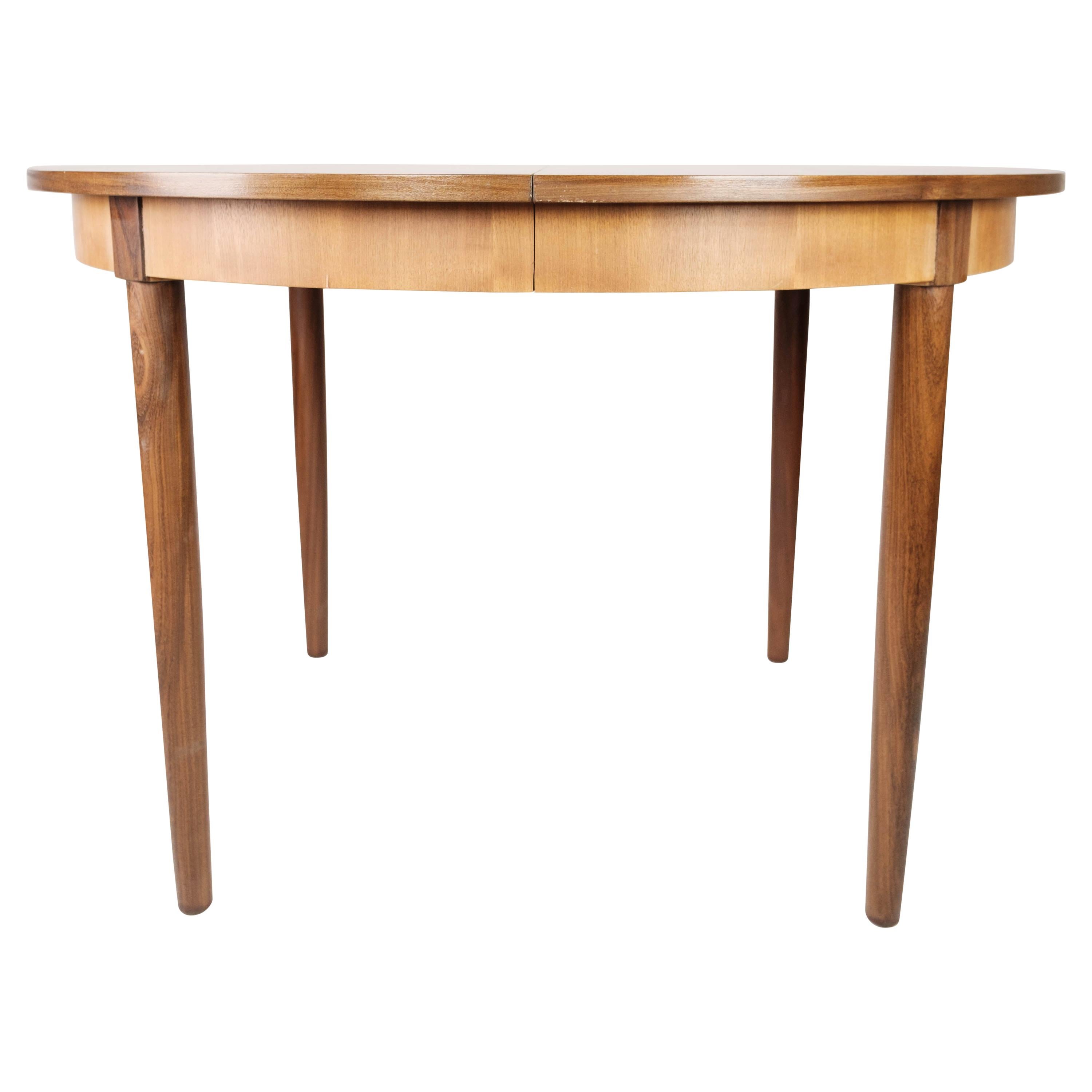 Dining Table in Teak with Extensions, of Danish Design from the 1960s