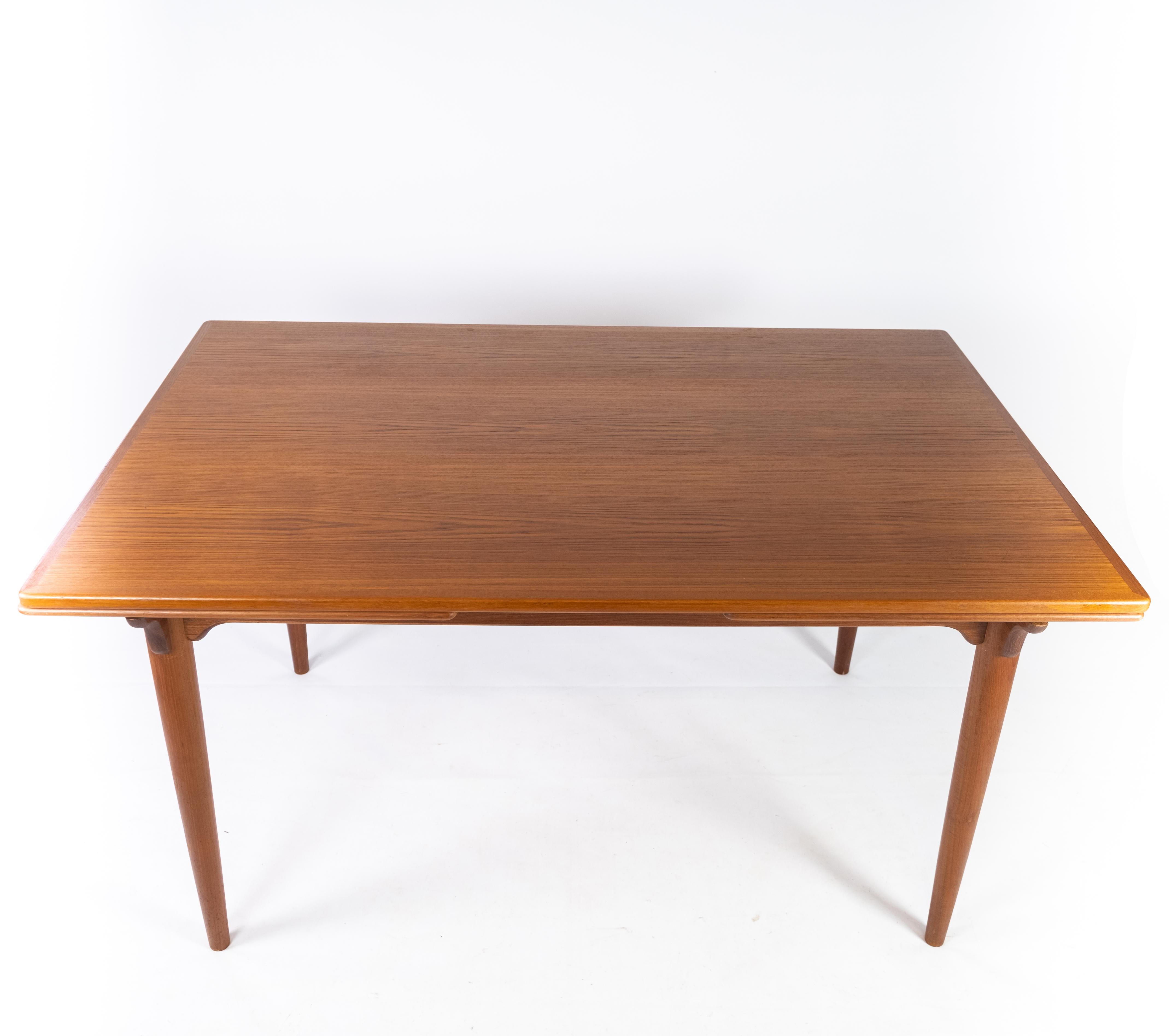 Mid-20th Century Dining Table Made In Teak With Extentions, Danish Design From 1960s For Sale