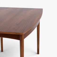 Dining table in walnut by Finn Juhl