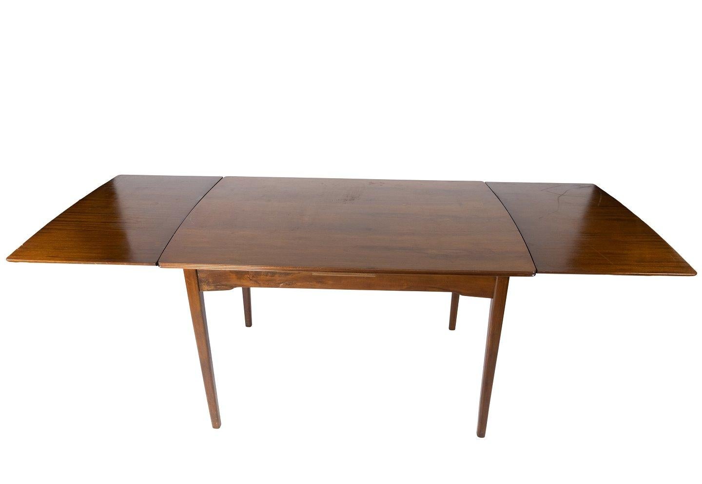 Scandinavian Modern Dining Table in Walnut with Extension of Danish Design from the 1960s