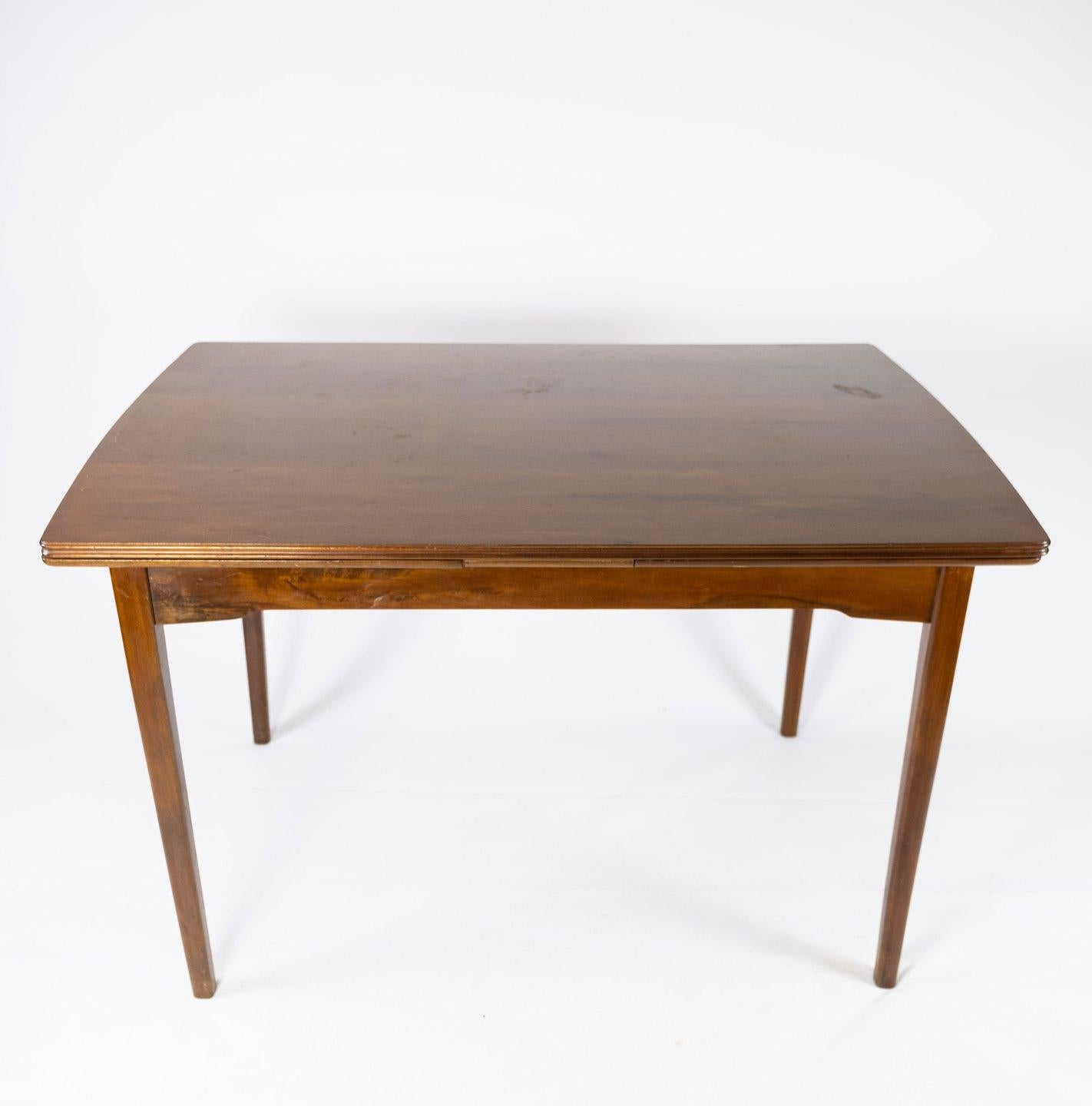 Mid-20th Century Dining Table in Walnut with Extension of Danish Design from the 1960s