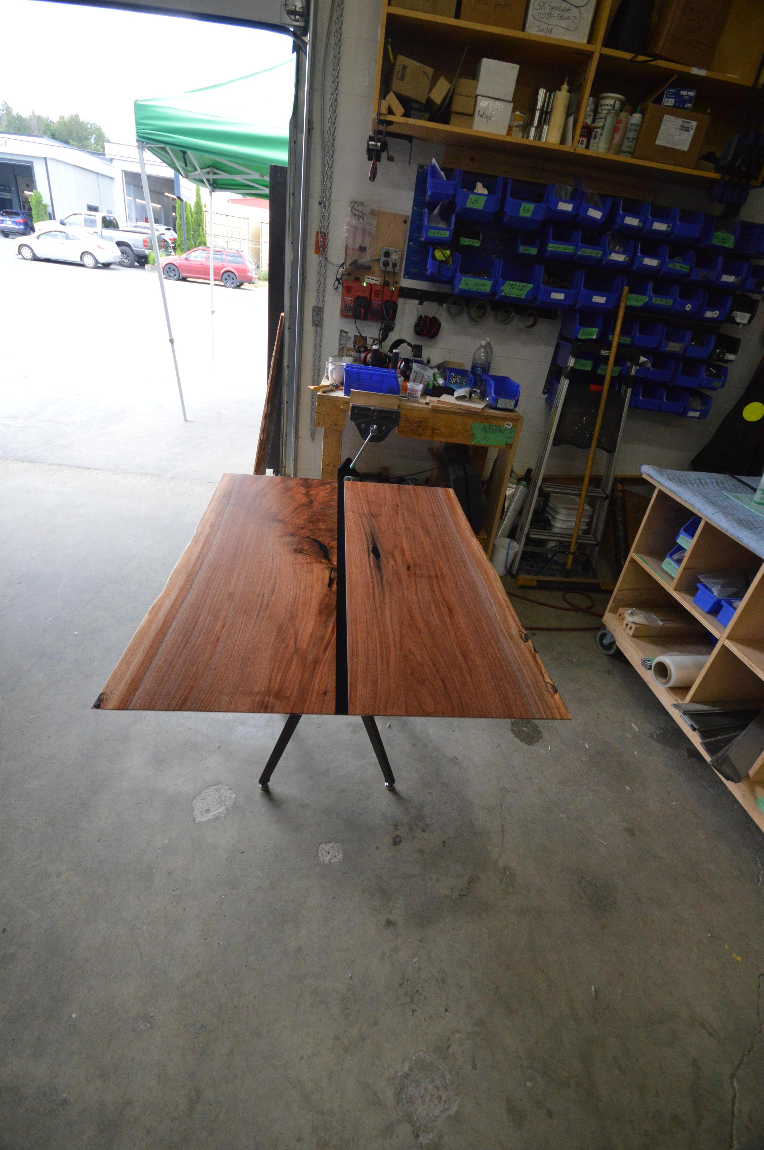 Mid-Century Modern Dining Table Made From Solid Walnut with Sleek Steel Legs in Brushed Bronze For Sale