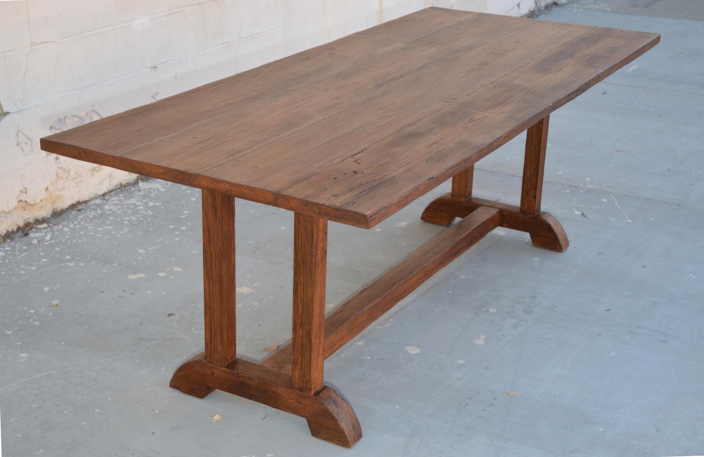 This custom dining table is made from hand selected, reclaimed heart-pine. Size shown here: 96