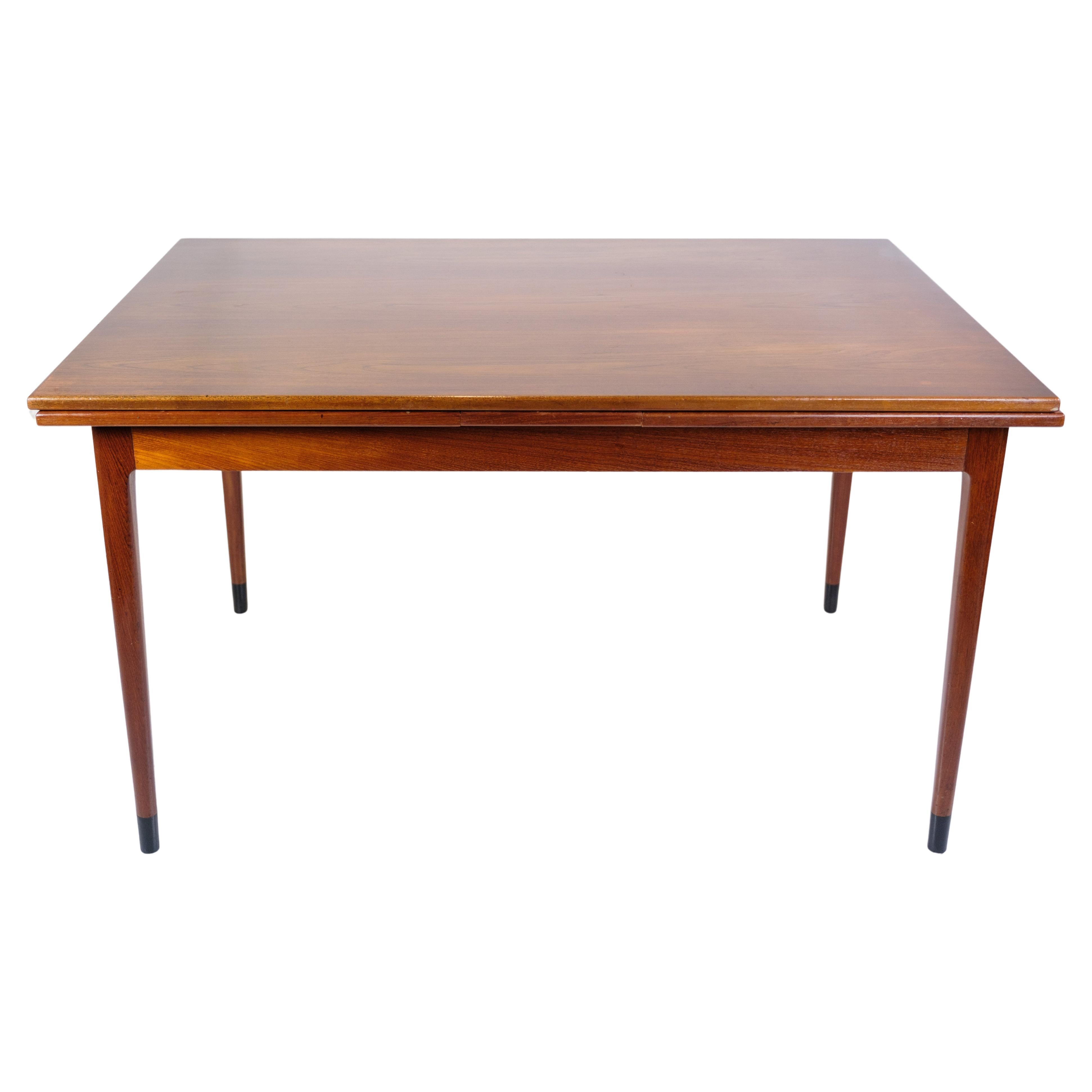Esstisch aus Teakholz mit Verlängerungen aus den 1960er Jahren im Angebot