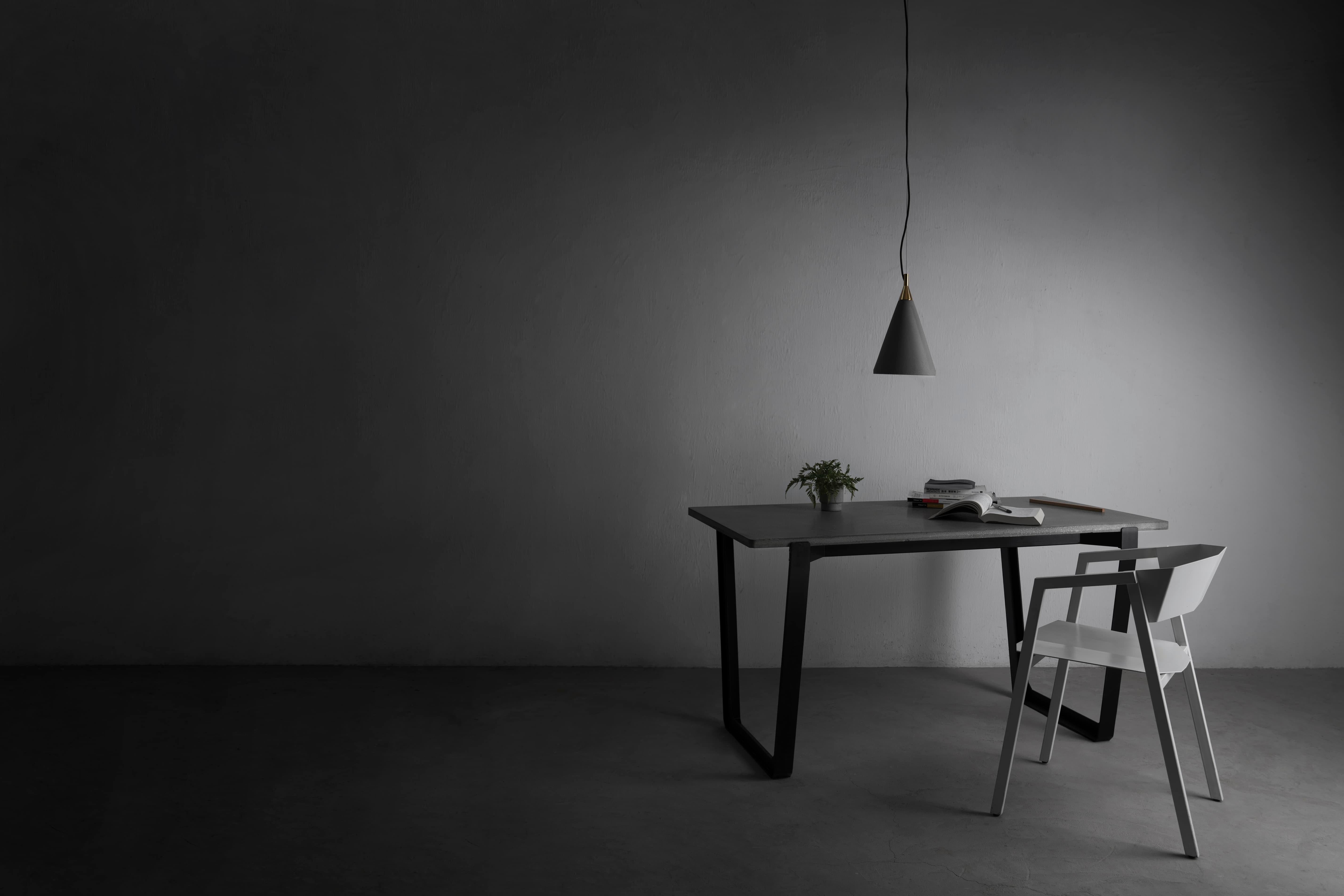 'NIAN' is a dining table
by Bentu Design

Table top: concrete
Table base: powder coated steel

4 sizes available: 
- Small: 180 x 80 cm (H 74cm)
- Medium: 200 x 80 cm (H 74cm)
- Large: 250 x 100 cm (H 74cm)
- Extra Large: 300 x 100 cm (H