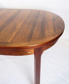 Mesa de comedor de diseño danés realizada en nogal de alrededor de los años 60