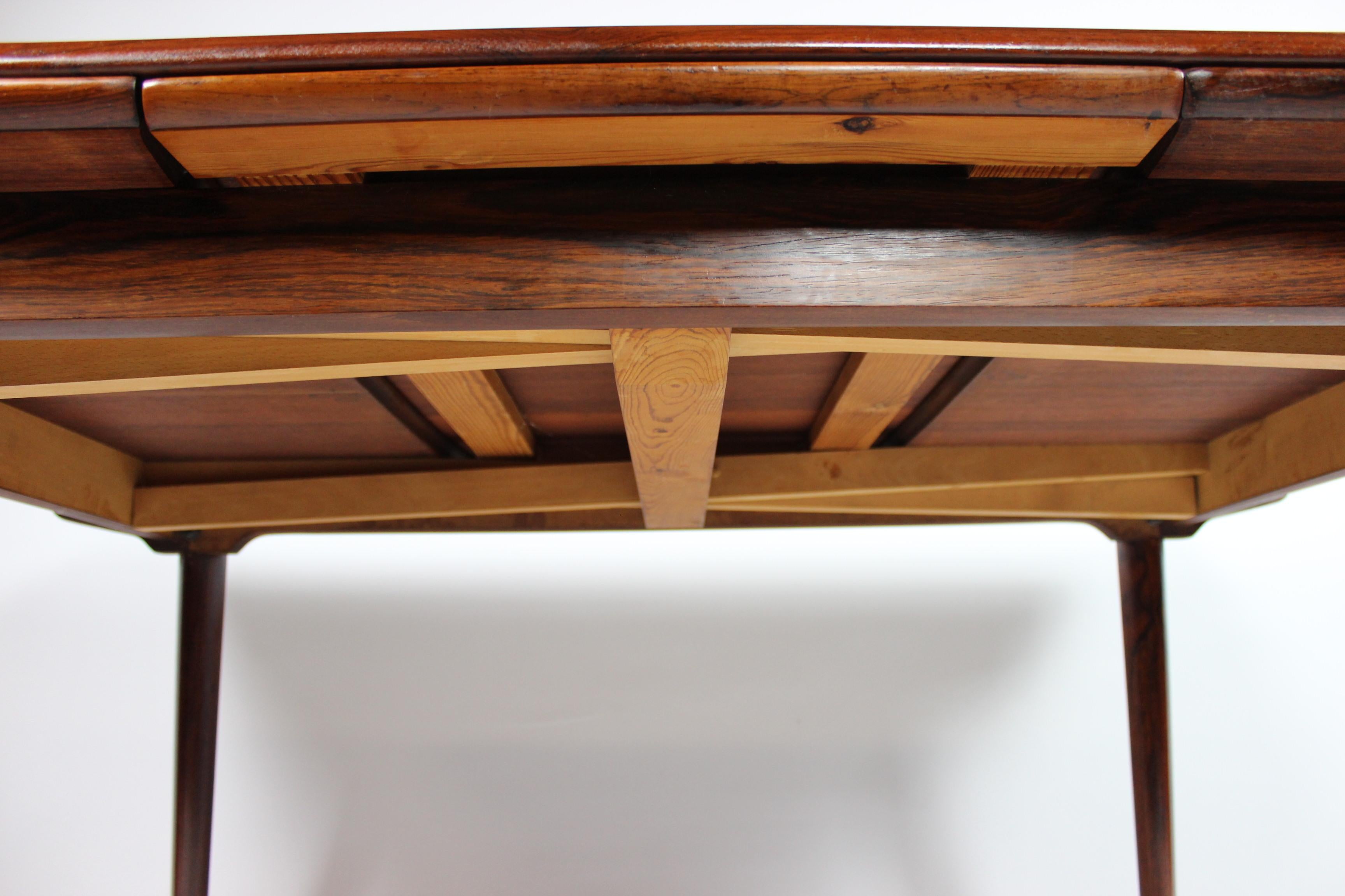 Mid-20th Century Dining Table of Rosewood with Dutch Extension Designed by Arne Vodder, 1960s