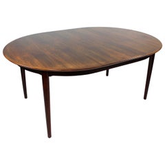 Vintage Dining Table of Rosewood with Three Extension Plates by Arne Vodder, 1960s