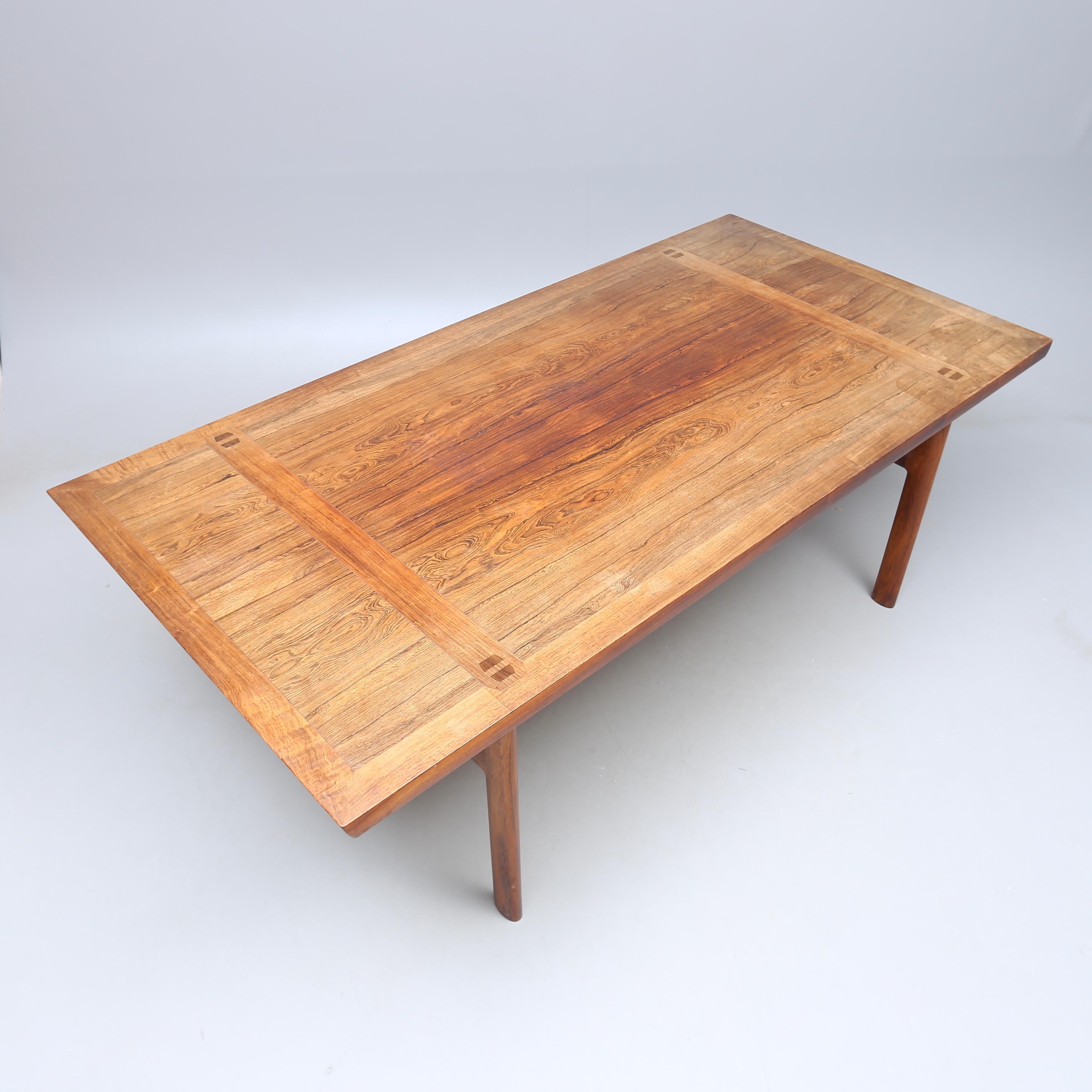 Rare dining table, partly jacaranda, probably for Ludvig Pontoppidan, Denmark, unmarked, 1950s / 1960s. Reportedly purchased in Copenhagen 1967/1968. Unknown maker.

