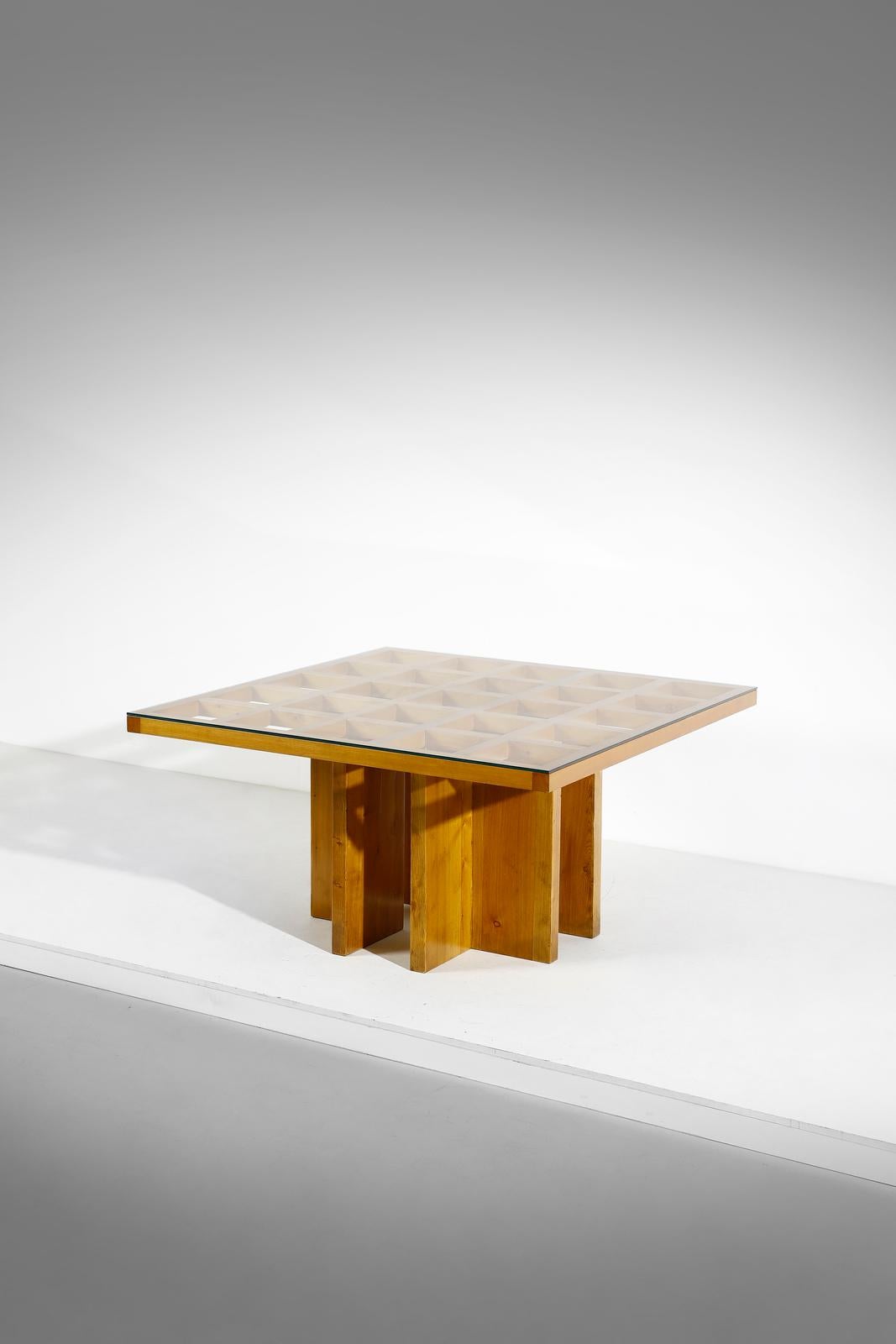 Very rare dining table in pine wood and glass top design by Gianfranco Fini manufactured by Poltronova in 1975. Made in Italy
Structure in pine wood, tempered glass top which protect a geometrical design of incredible beauty.

The table is published