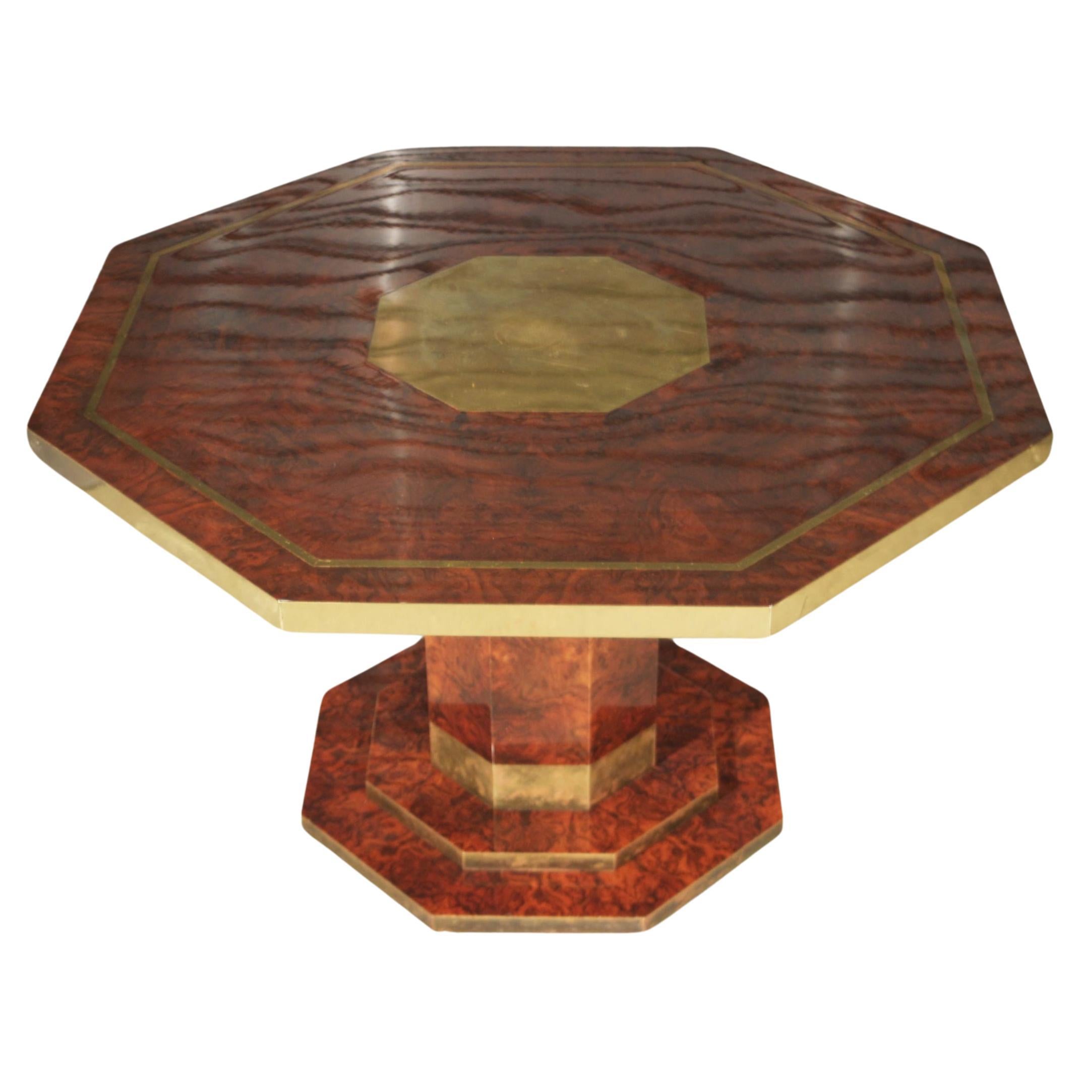 Dining table signed by Jean Claude Mahey in lacquered elm burl and brass For Sale