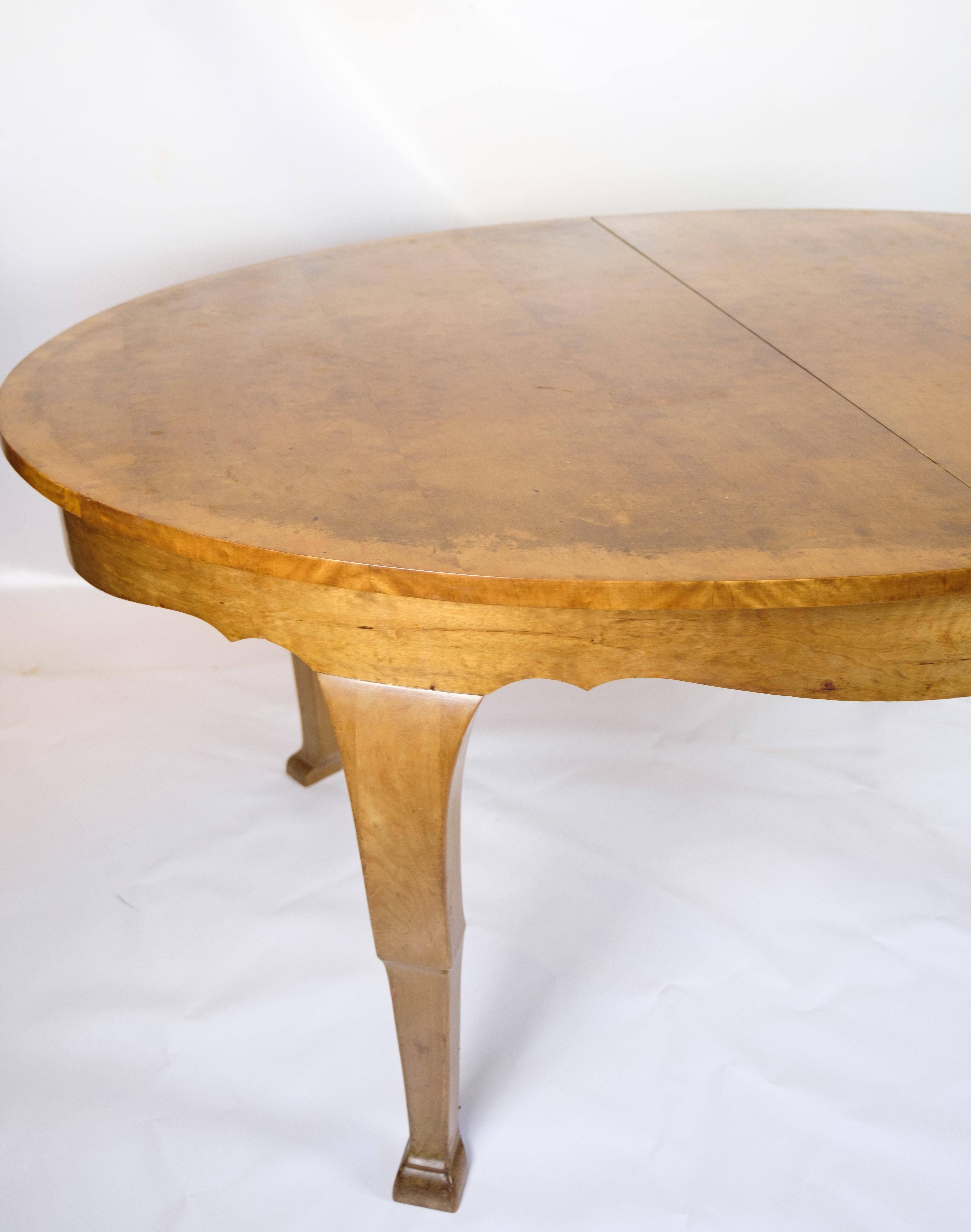 Danish Dining table with additional plates made of birch wood from around the 1920s For Sale