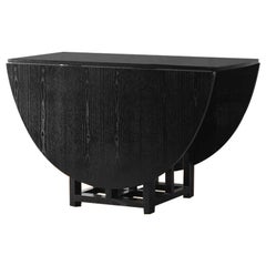 Dining table with double folding top by Charles Rennie Mackintosh for Cassina