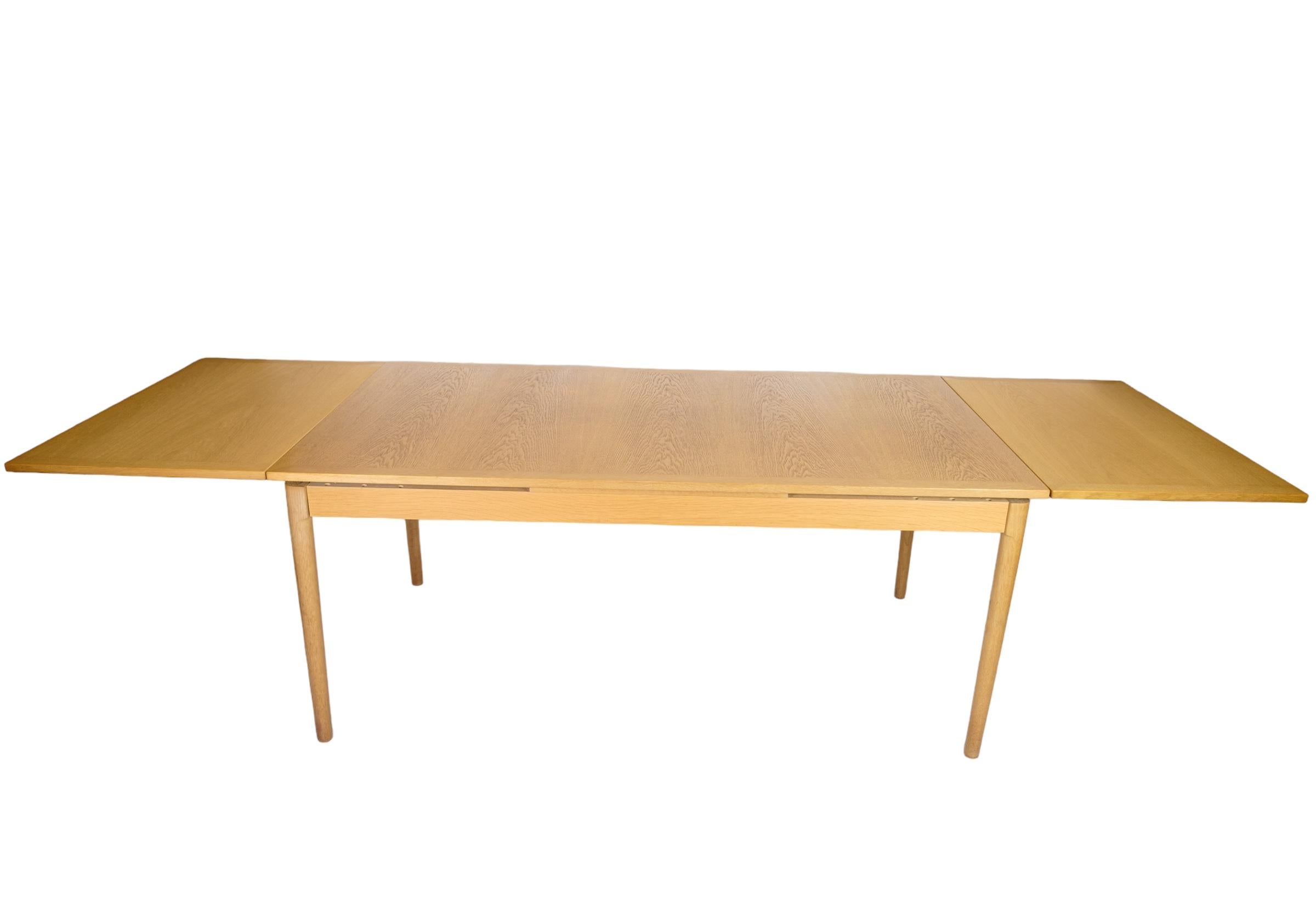 Dining table with Dutch extension, designed by Kaj Winding from the 1960s  For Sale 4