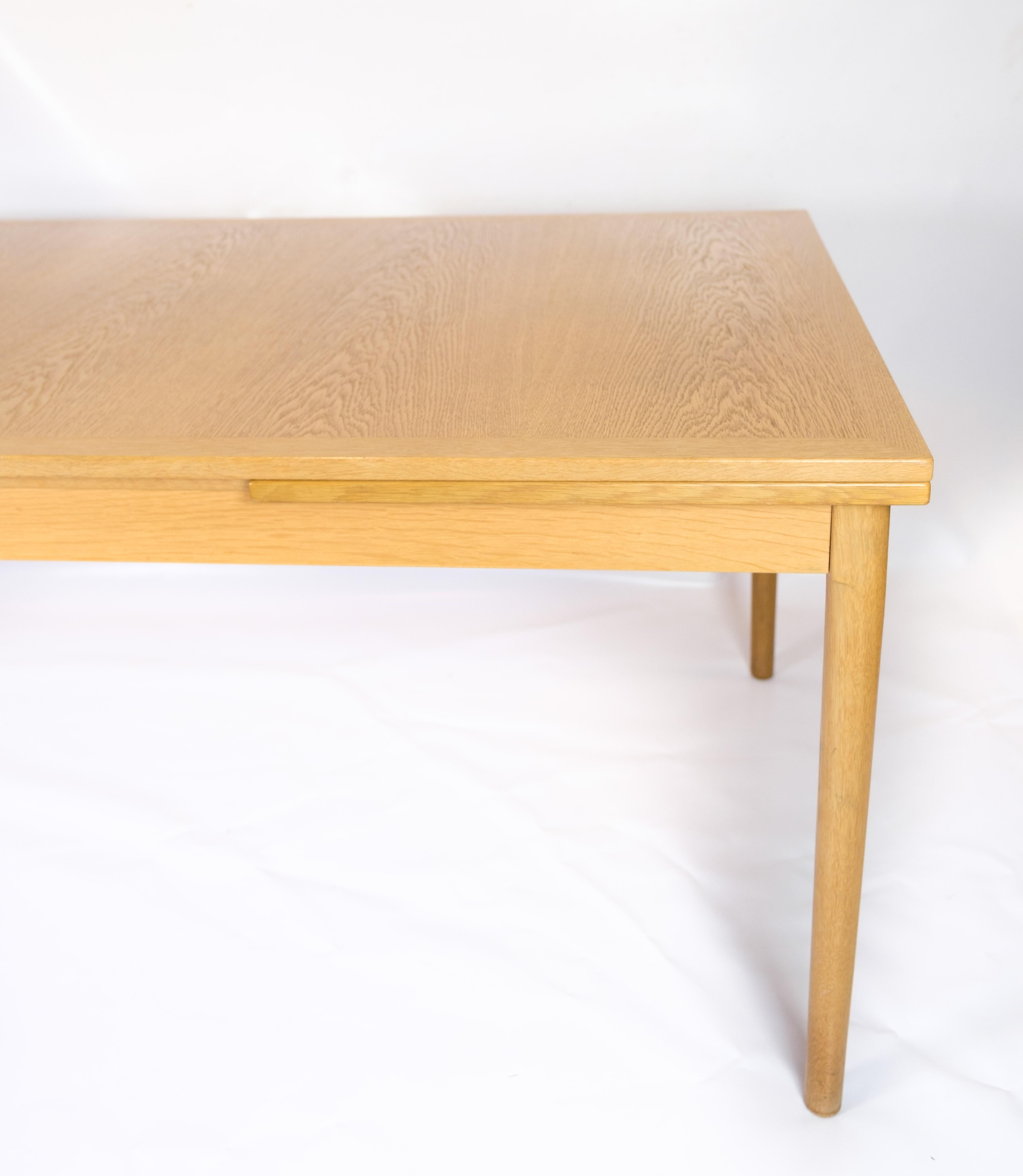 Danish Dining table with Dutch extension, designed by Kaj Winding from the 1960s  For Sale