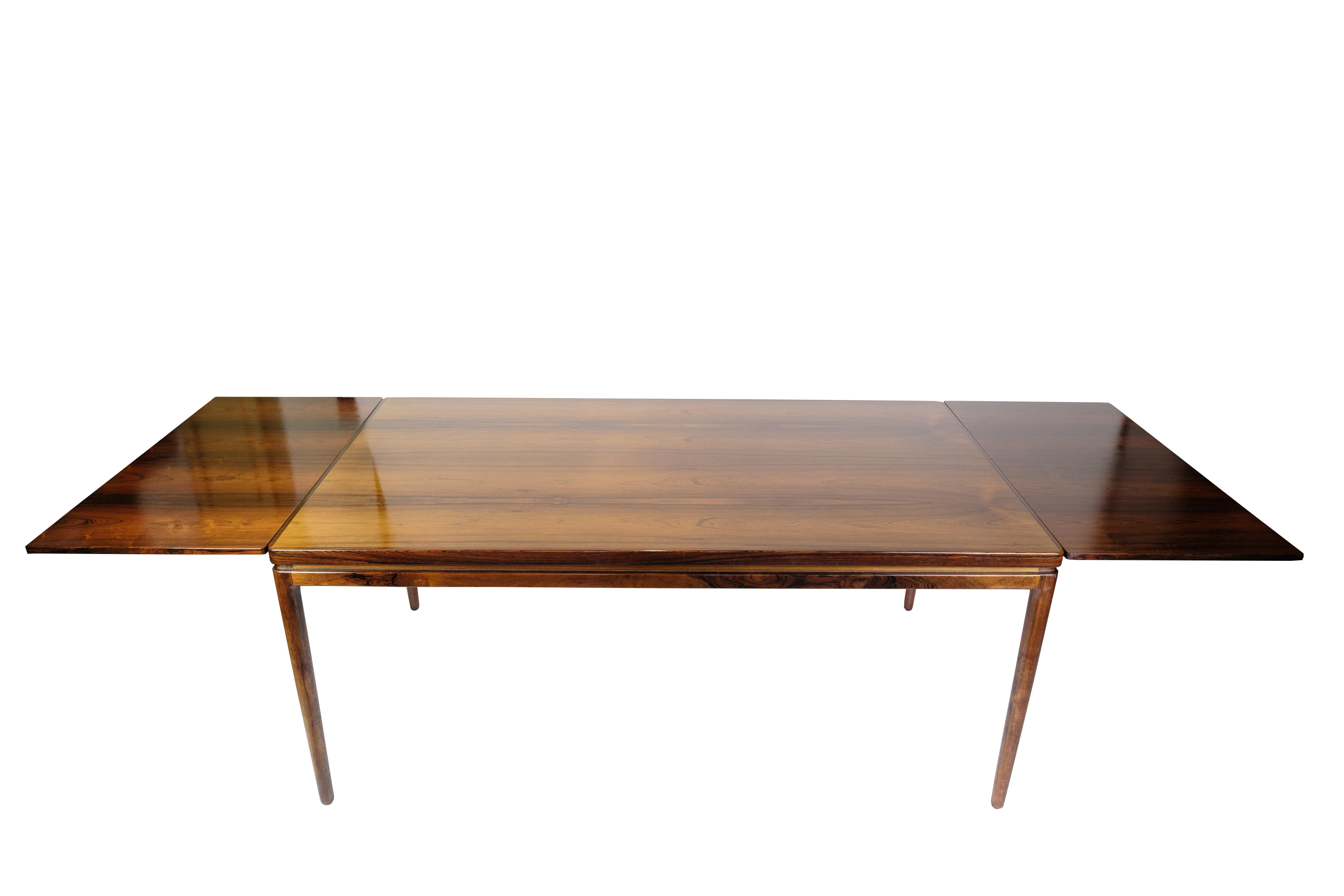 Mesa de comedor extensible de palisandro de Johannes Andersen de los años 60 mediados del siglo XX en venta