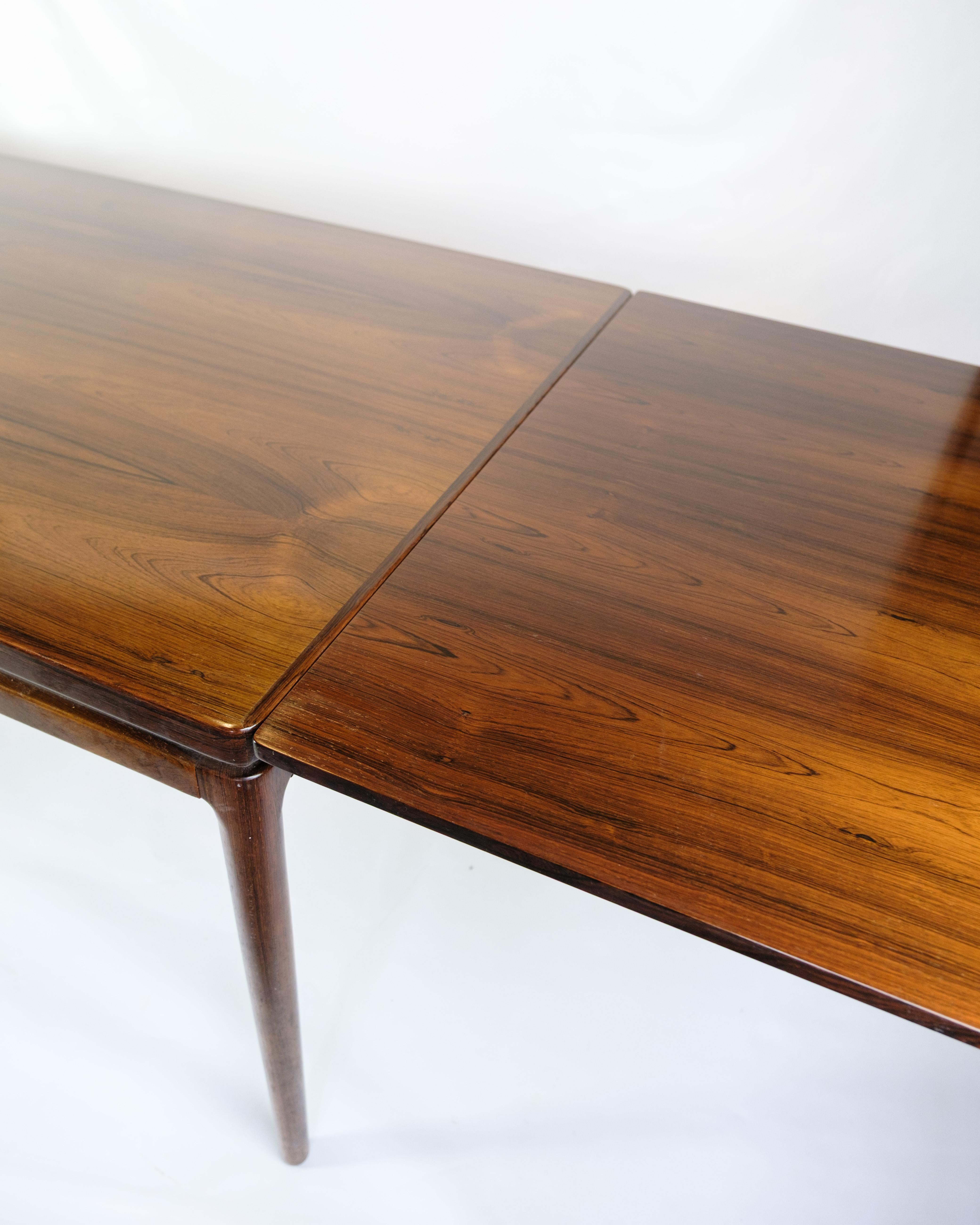 Mesa de comedor extensible de palisandro de Johannes Andersen de los años 60 Palo de rosa en venta