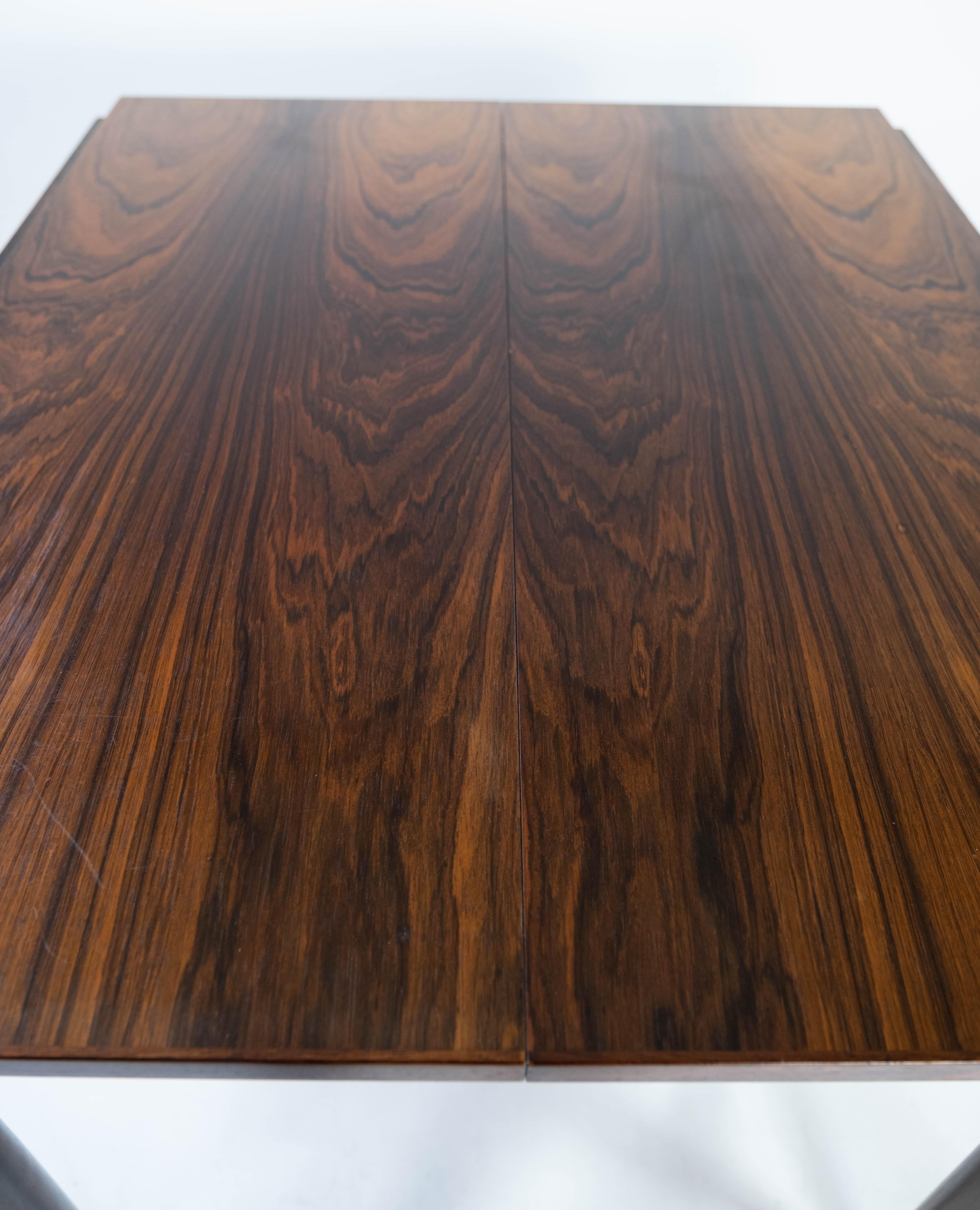 Scandinavian Modern Dining Table with Extensions, in Rosewood Designed by Arne Vodder from the 1960s