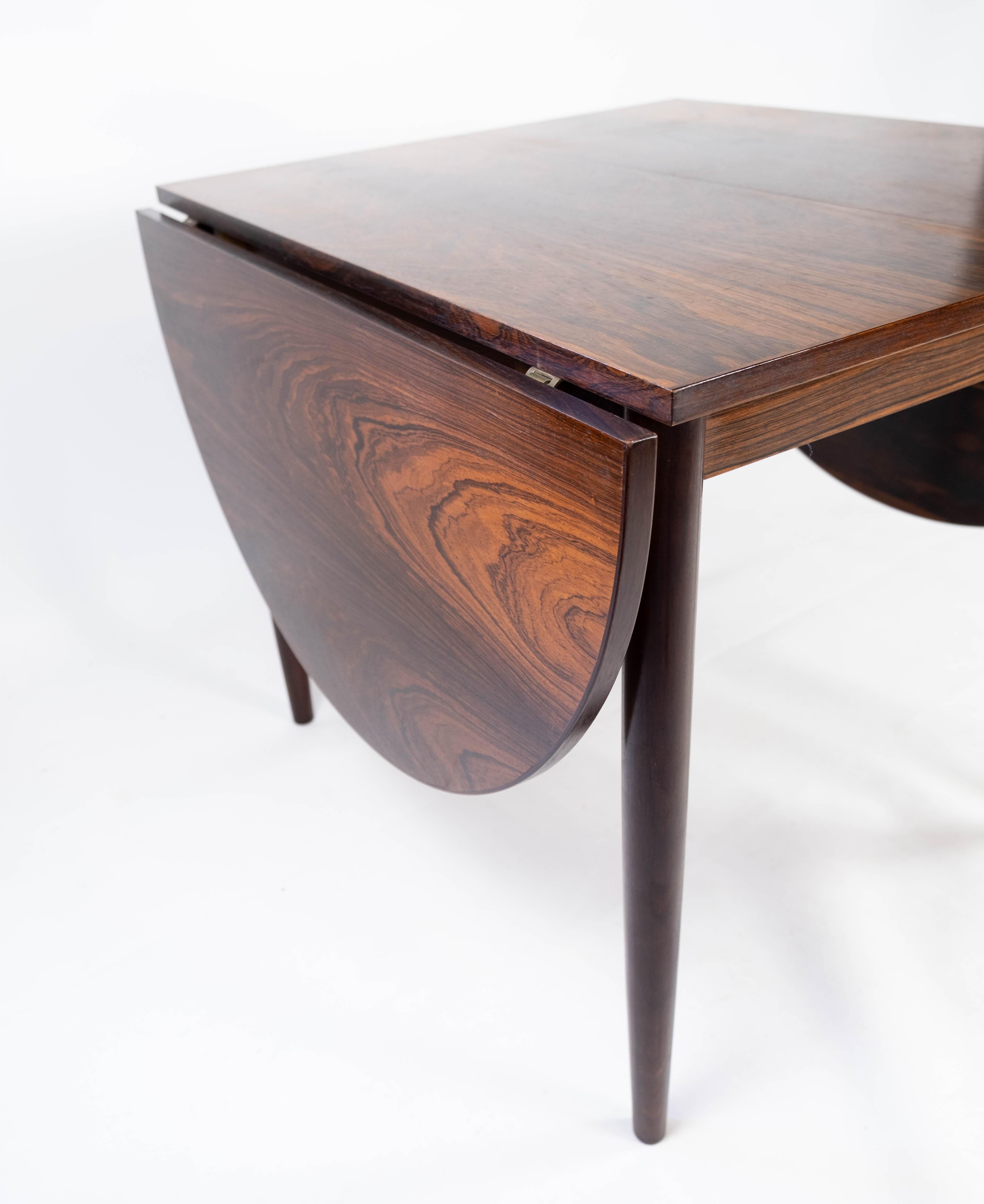 Danish Dining Table with Extensions, in Rosewood Designed by Arne Vodder from the 1960s