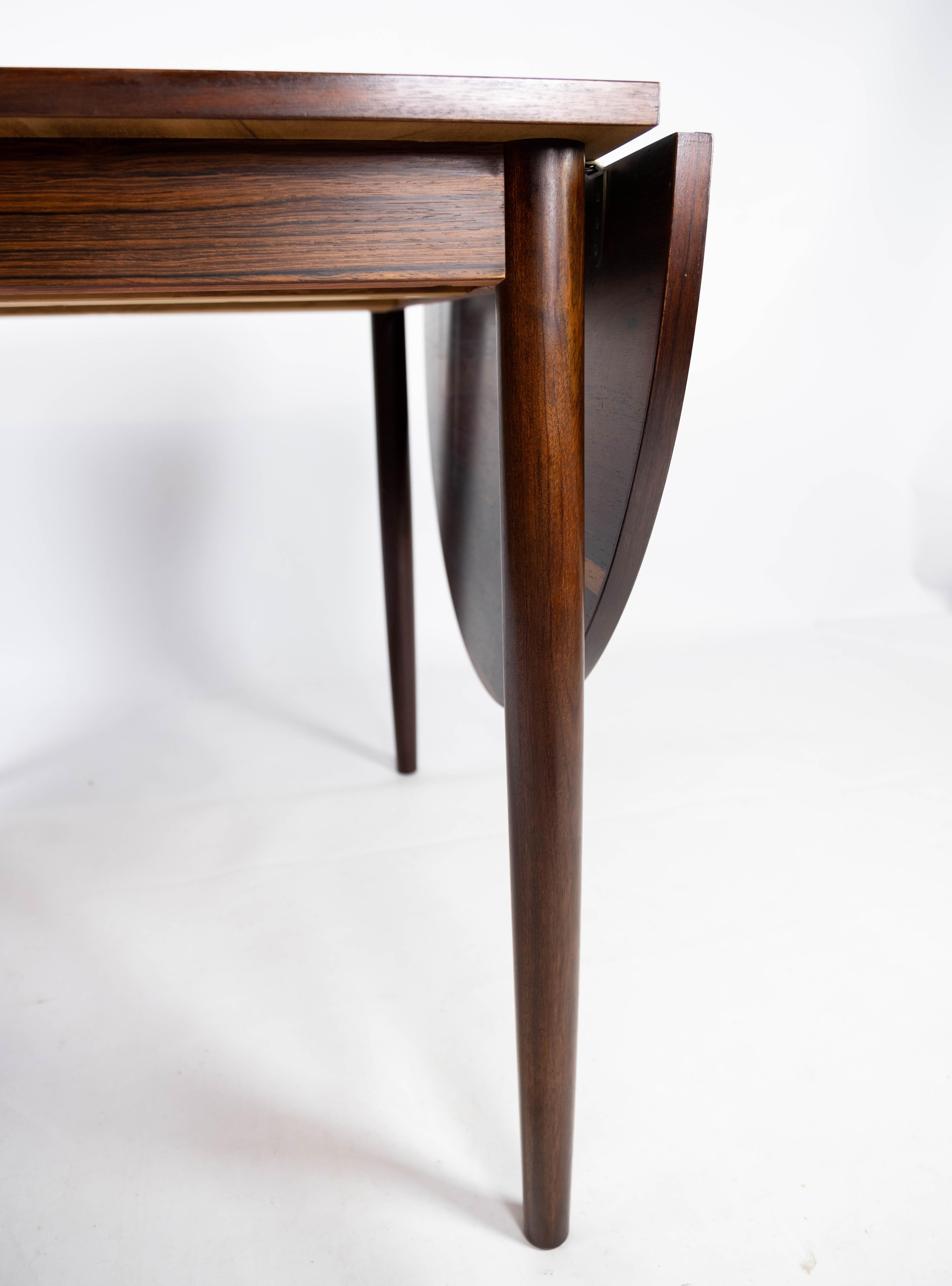 Mid-20th Century Dining Table with Extensions, in Rosewood Designed by Arne Vodder from the 1960s