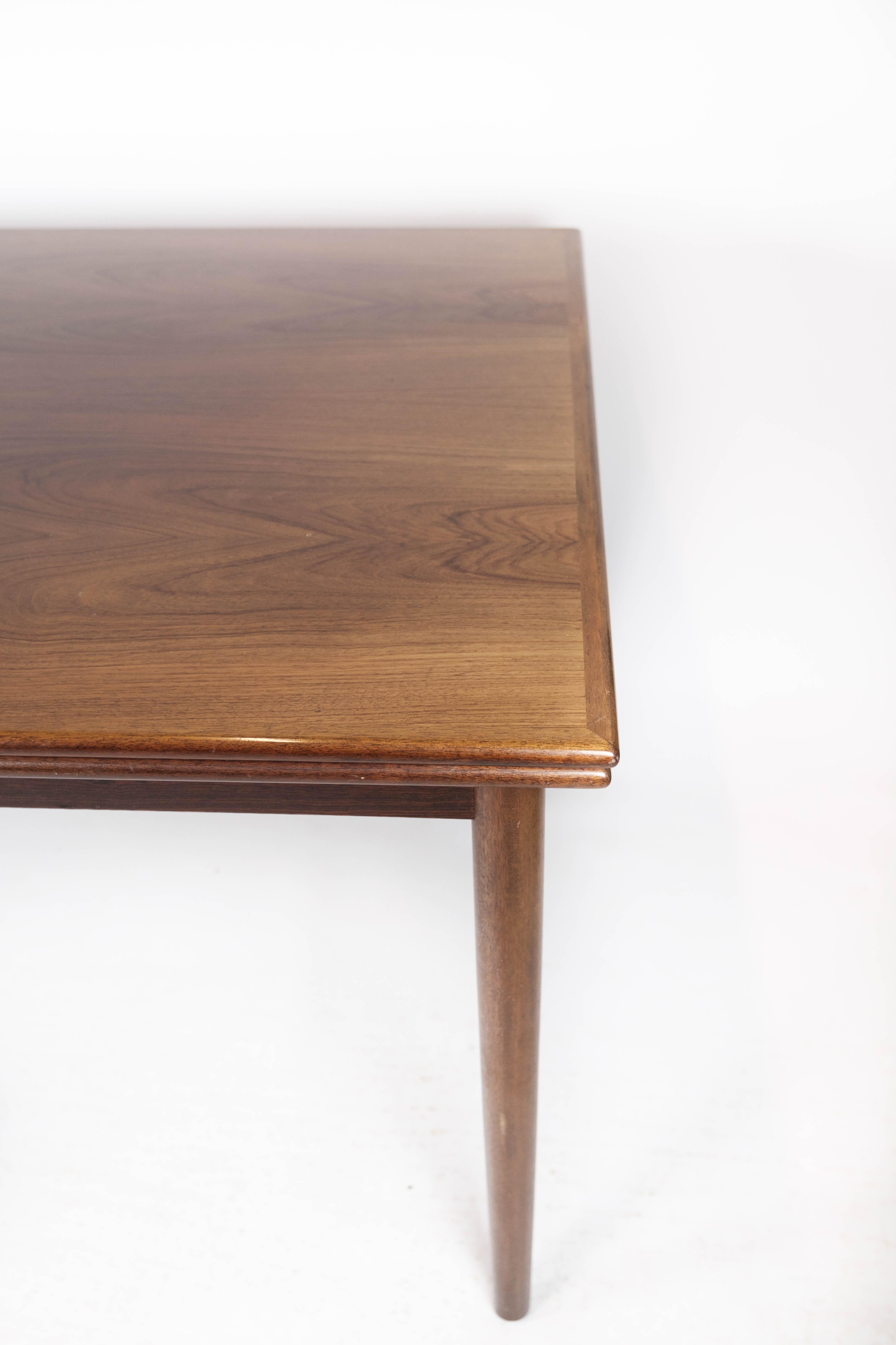 Mid-20th Century Dining Table With Extensions Made In Rosewood Danish Design From 1960s For Sale