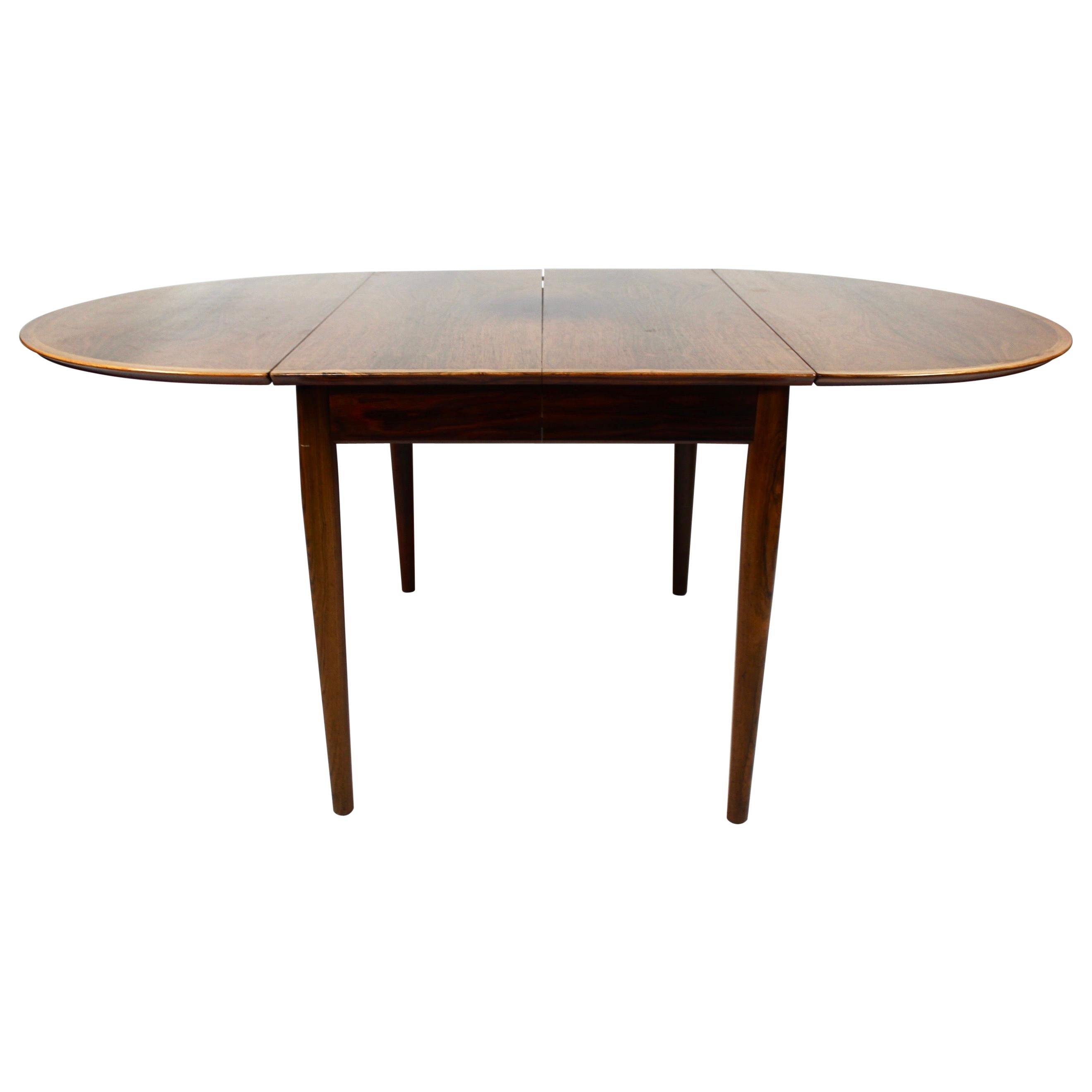 Dining Table with Extensions in Rosewood of Danish Design from the 1960s