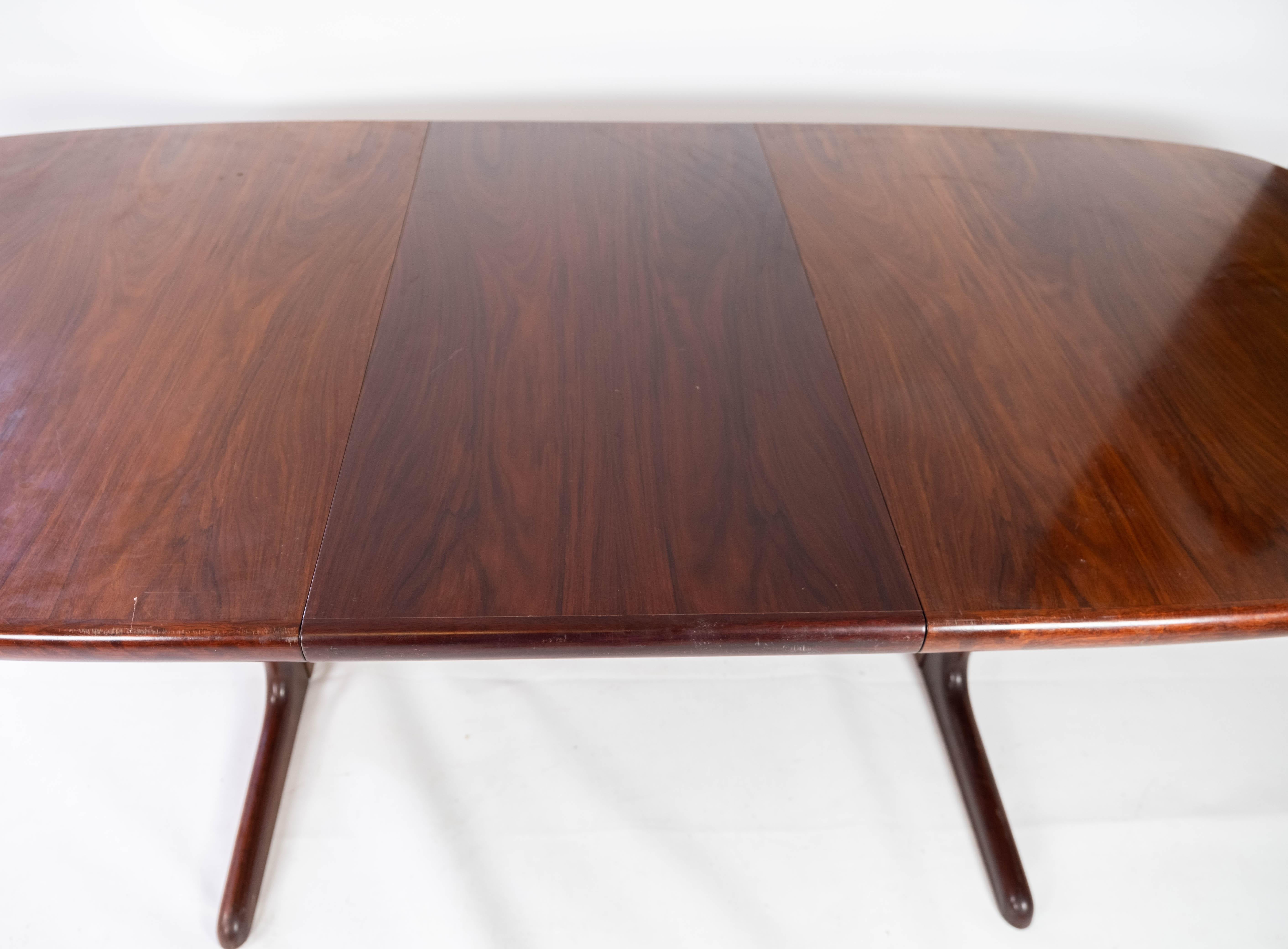 Dining Table with Extensions in Rosewood of Danish Design Manufactured by Skovby 11