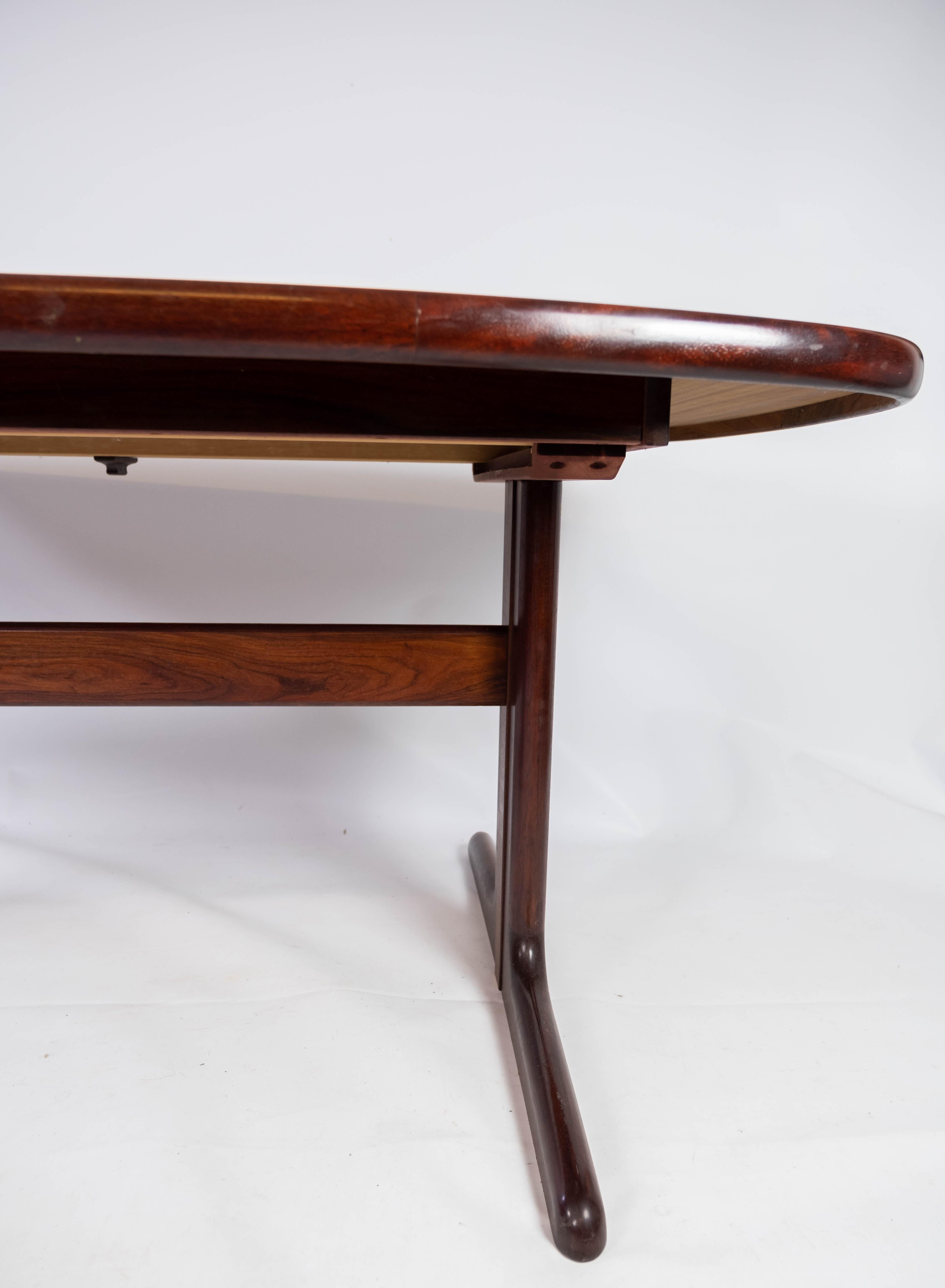 Dining Table with Extensions in Rosewood of Danish Design Manufactured by Skovby 1