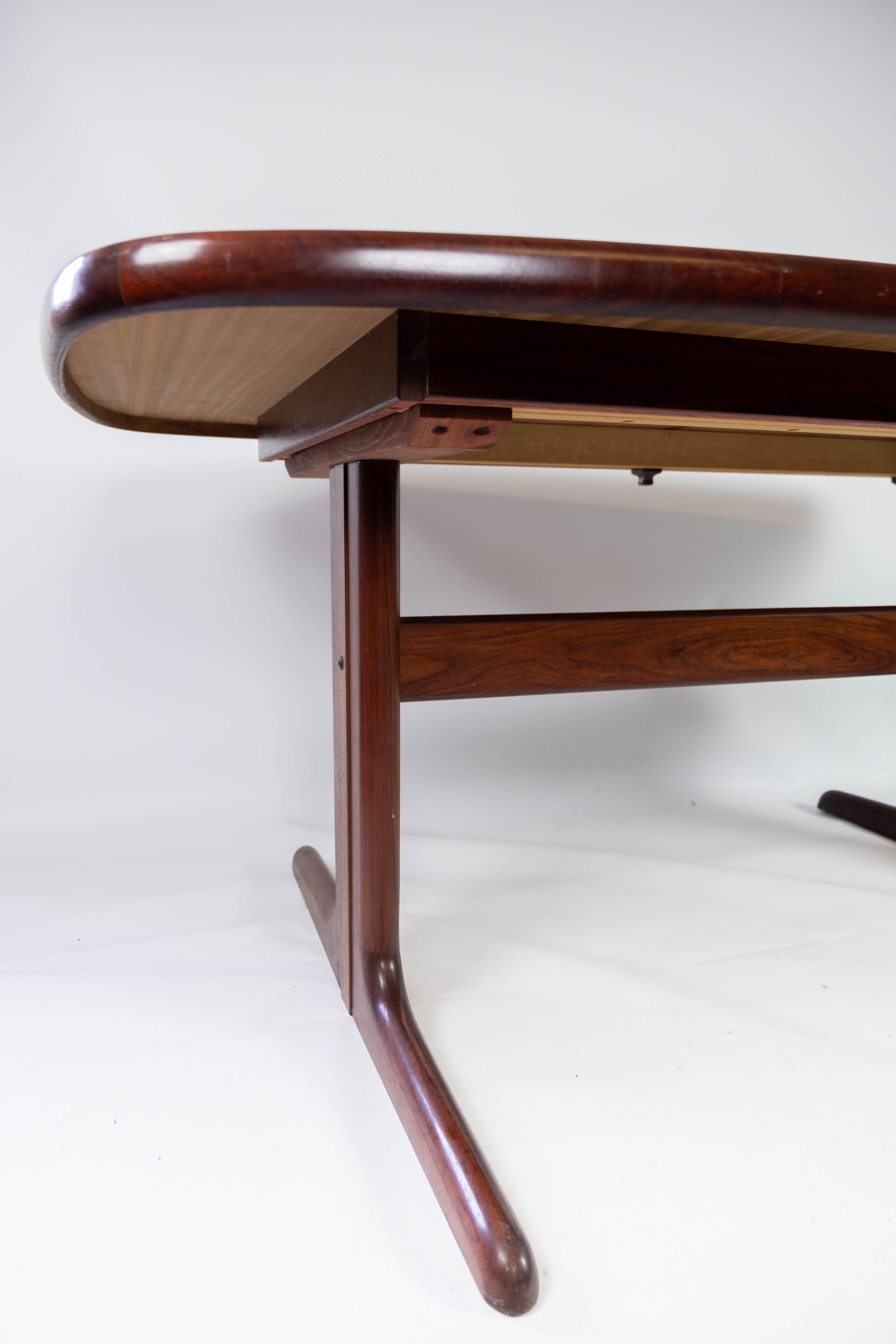Dining Table with Extensions in Rosewood of Danish Design Manufactured by Skovby 3