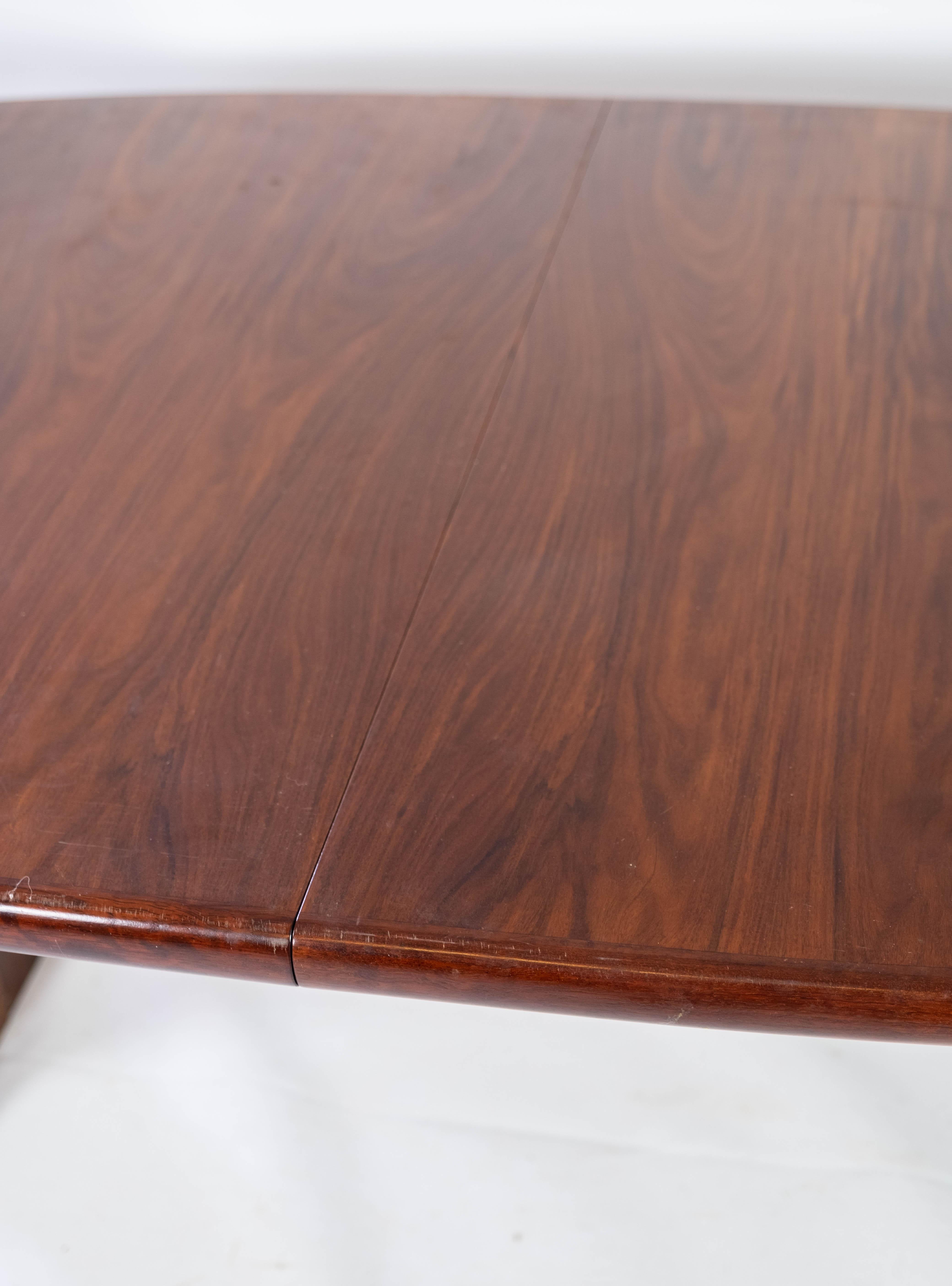 Dining Table with Extensions in Rosewood of Danish Design Manufactured by Skovby 4